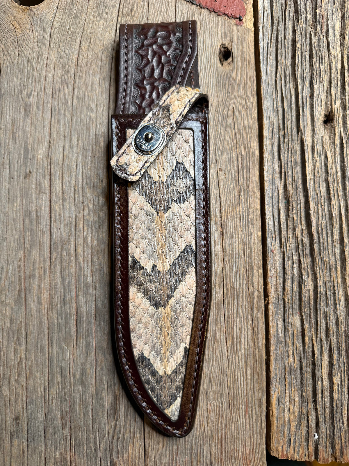 Randall Model 14 sheath with a Canebrake RattleSnake skin from Treeman Sheaths. Vibrant colors and along side Copperheads the hardest skin to source.