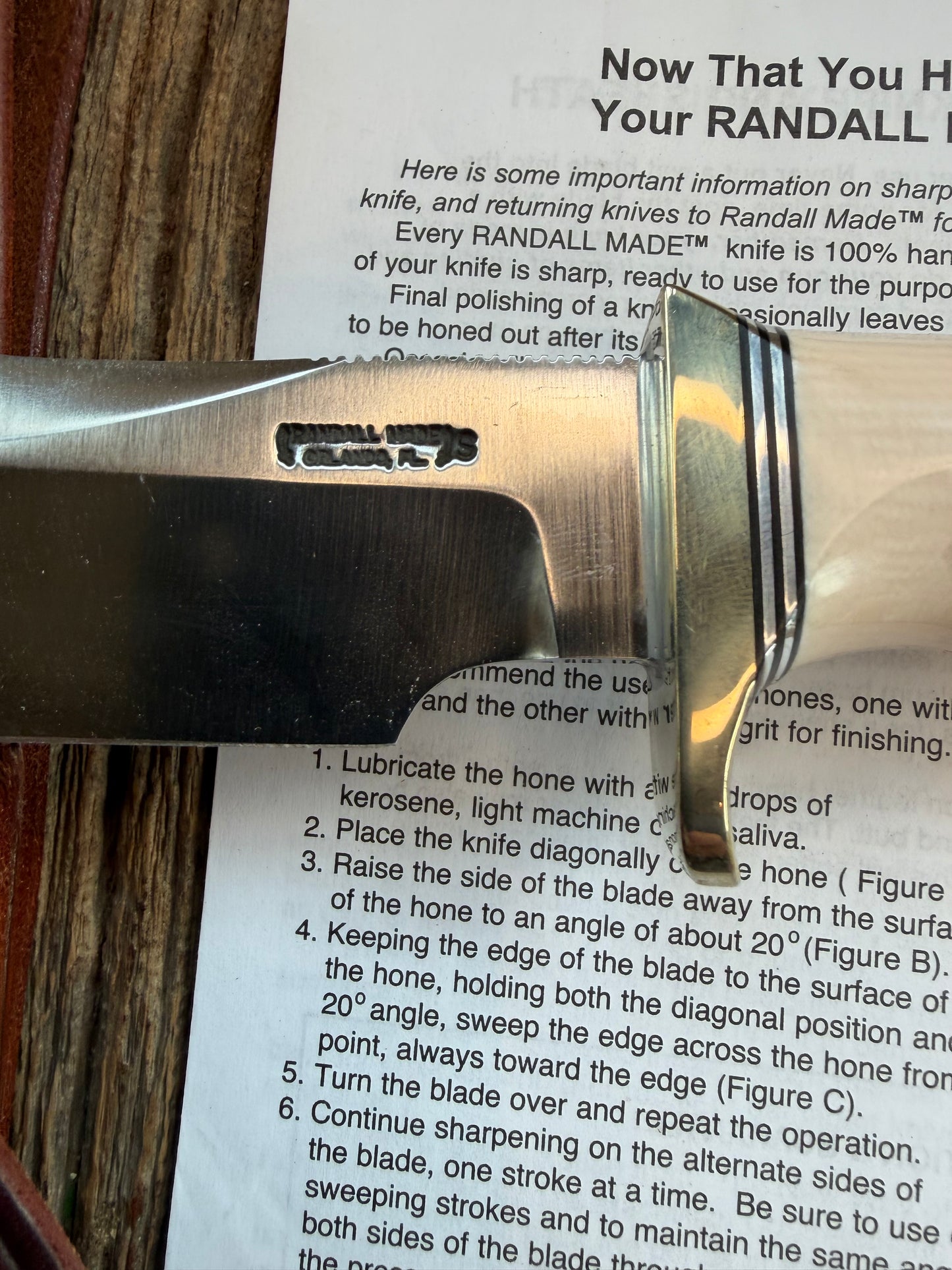 New Randall Model Bowles Skinner # 504 with a Warthers Resin finger grooves handle. Nickel silver Single Hilt and natural end with a compass.
