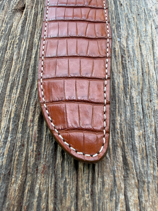 New Randall Model 1-8 Sheath in Exotic thick and textured Honey Crocodile skin on brown leather from Treeman with a silver Canteen snap. Hand tooled belt loop. Killer sheath.