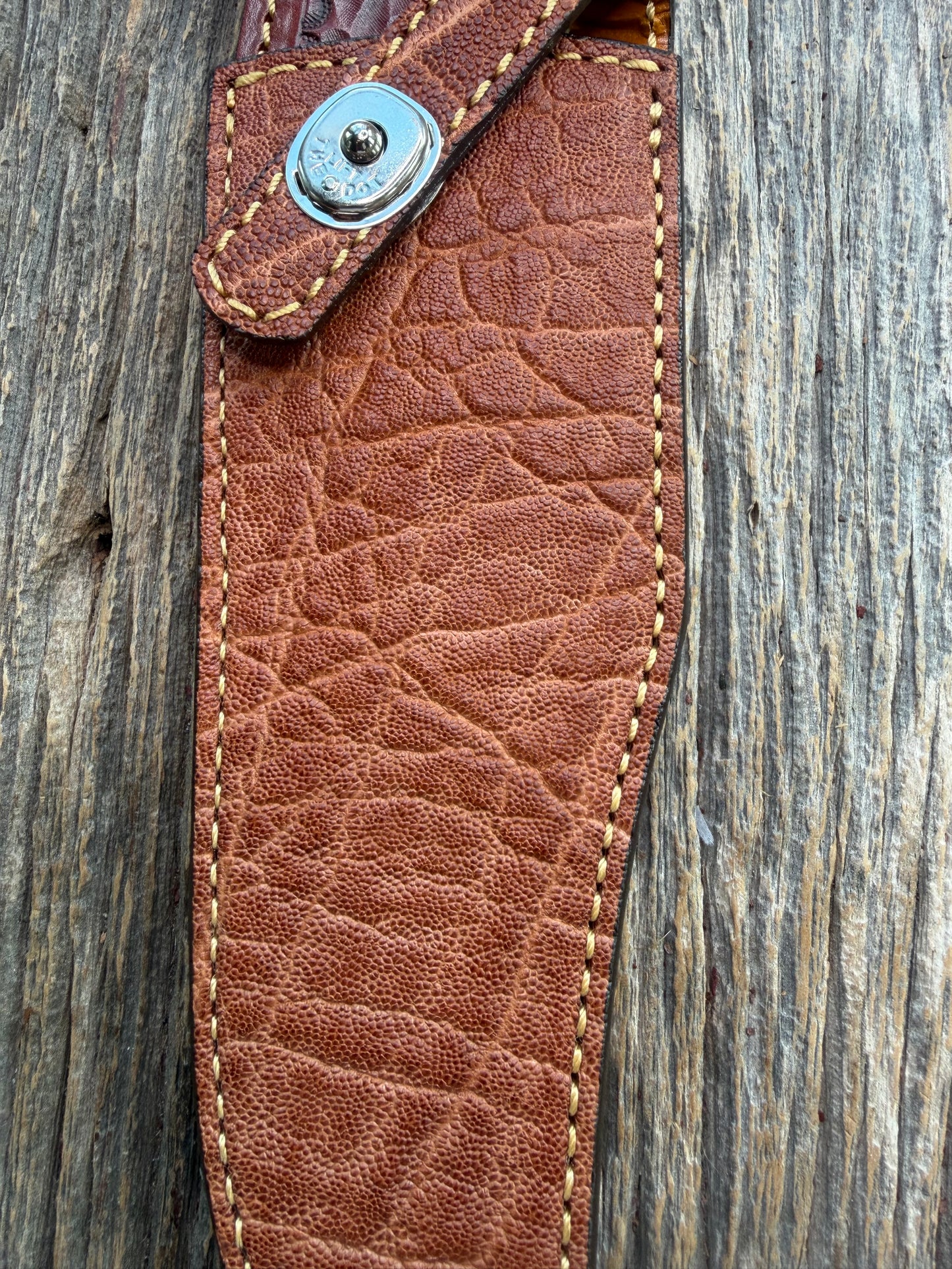 New Randall Model 12-8 Big Bear Sheath in Exotic thick and textured Rust colored Elephant hide on brown leather from Treeman with a silver Canteen snap. Hand tooled belt loop. Killer sheath.