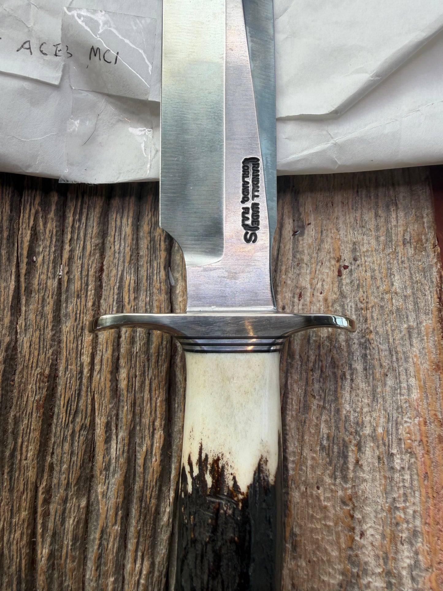 New in Paper Randall Made Knife Model 1-7 Stag , Stainless, Black and Aluminum spacers, Nickel Silver Hilt, Aluminum crows beak butt cap.