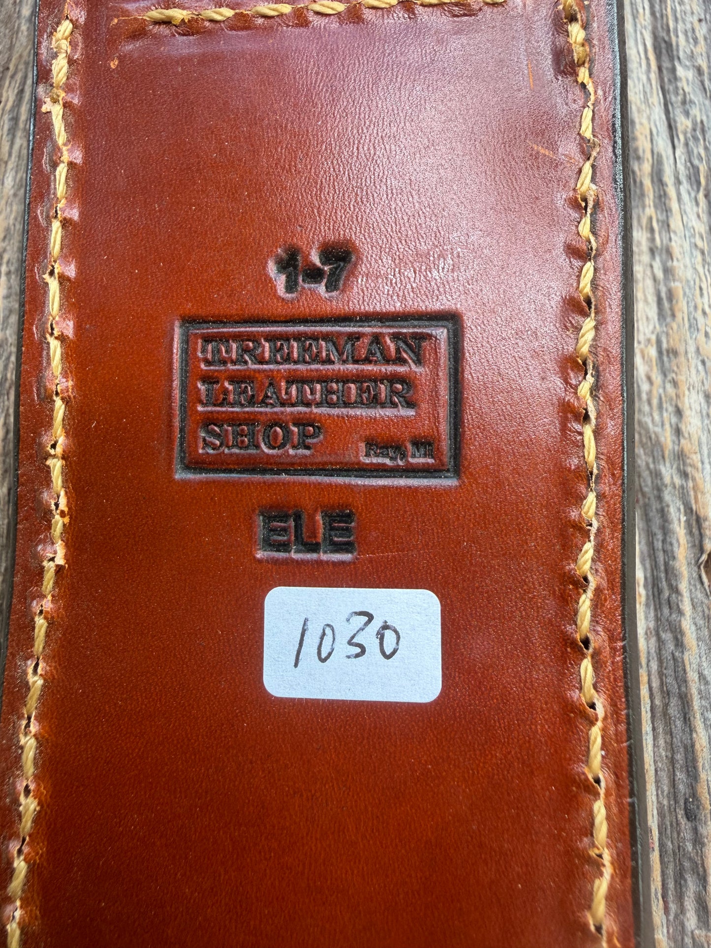 New Randall Model 1-7 Sheath in Exotic thick and textured Rust colored Elephant hide on brown leather from Treeman with a silver Canteen snap. Hand tooled belt loop. Killer sheath.