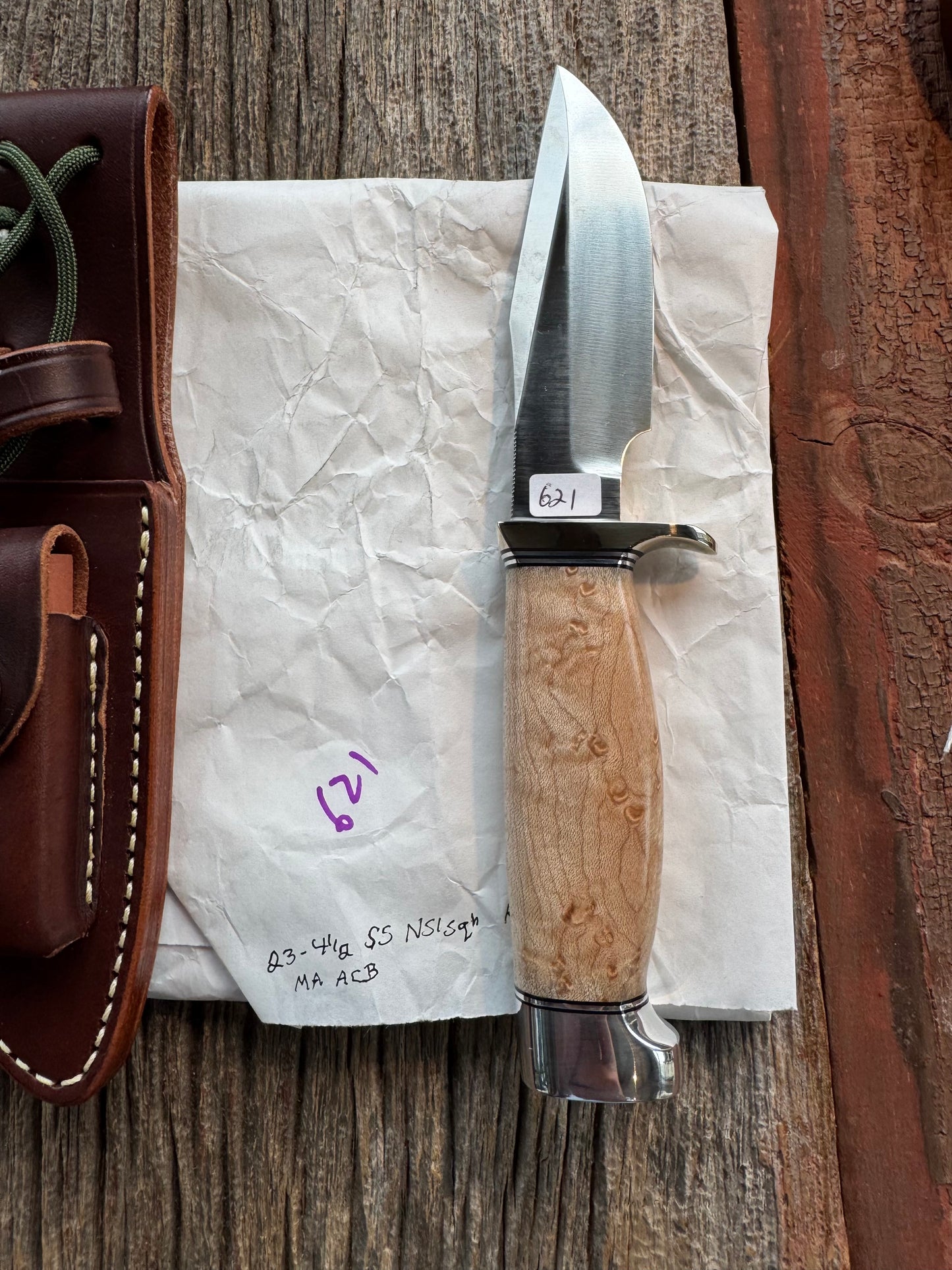 New in Paper Randall Model 23 Game Master Stainless steel blade, Nickel silver hilt and aluminum butt cap. Brown leather sheath. Maple wood handle.