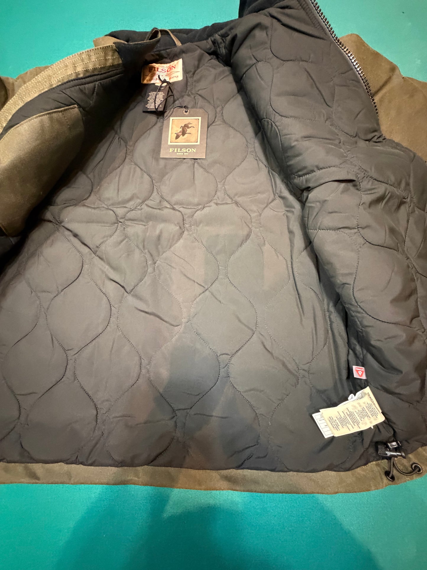NWT Filson TIN CLOTH PRIMALOFT® JACKET in Otter Green in a size Medium NWT