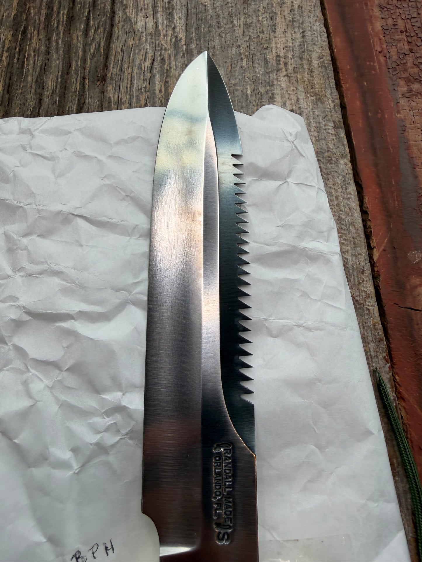 New in Paper Randall Model 14-7.5 in Black Micarta handle, Nickel Silver Hilt, Stainless steel, Sawteeth and Lanyard.