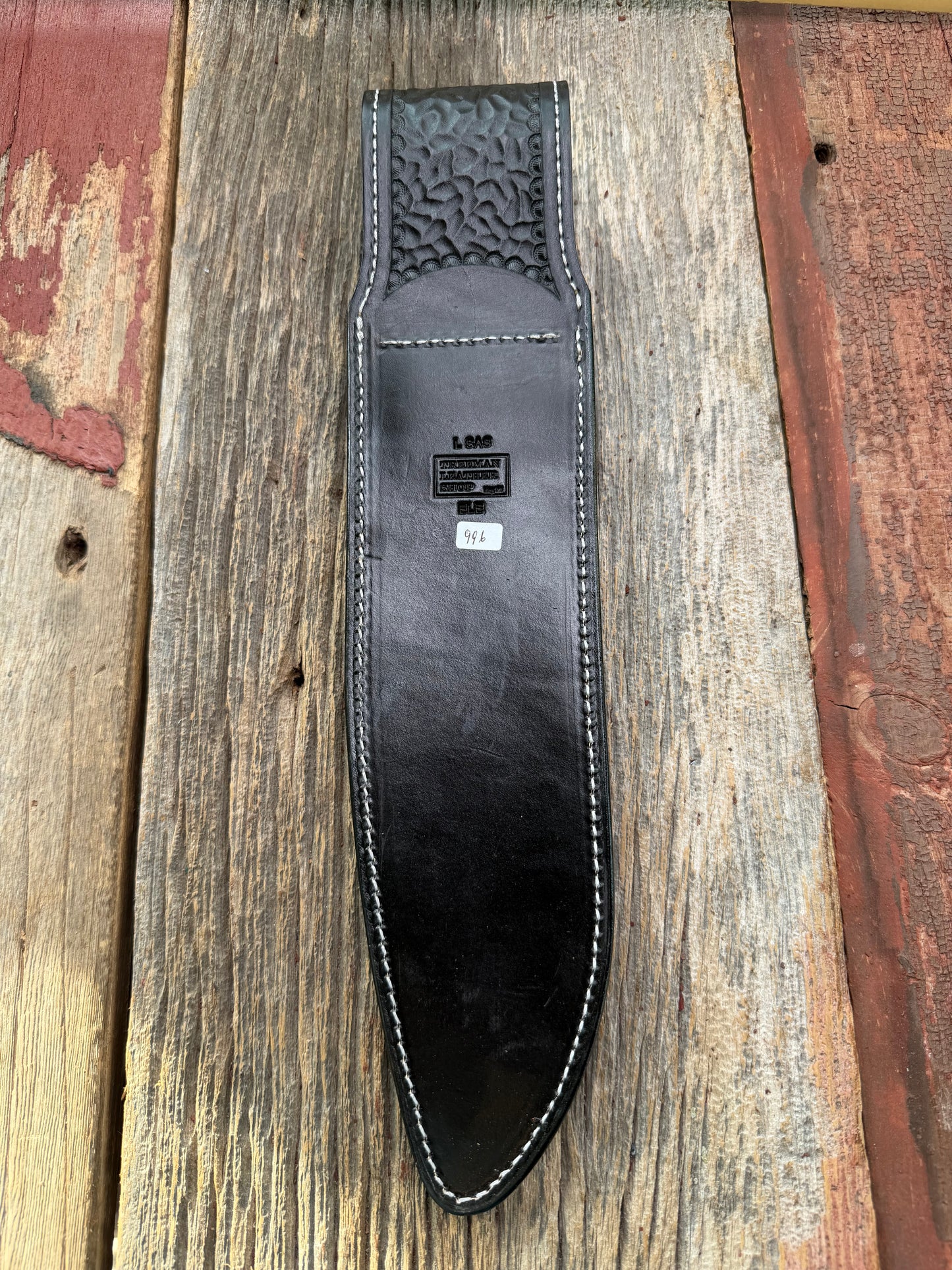 New Randall Model 12-11 Large Sasquatch Sheath in Exotic thick and textured Black Elephant hide on black leather from Treeman with a black Canteen snap. Hand tooled belt loop. Killer sheath.