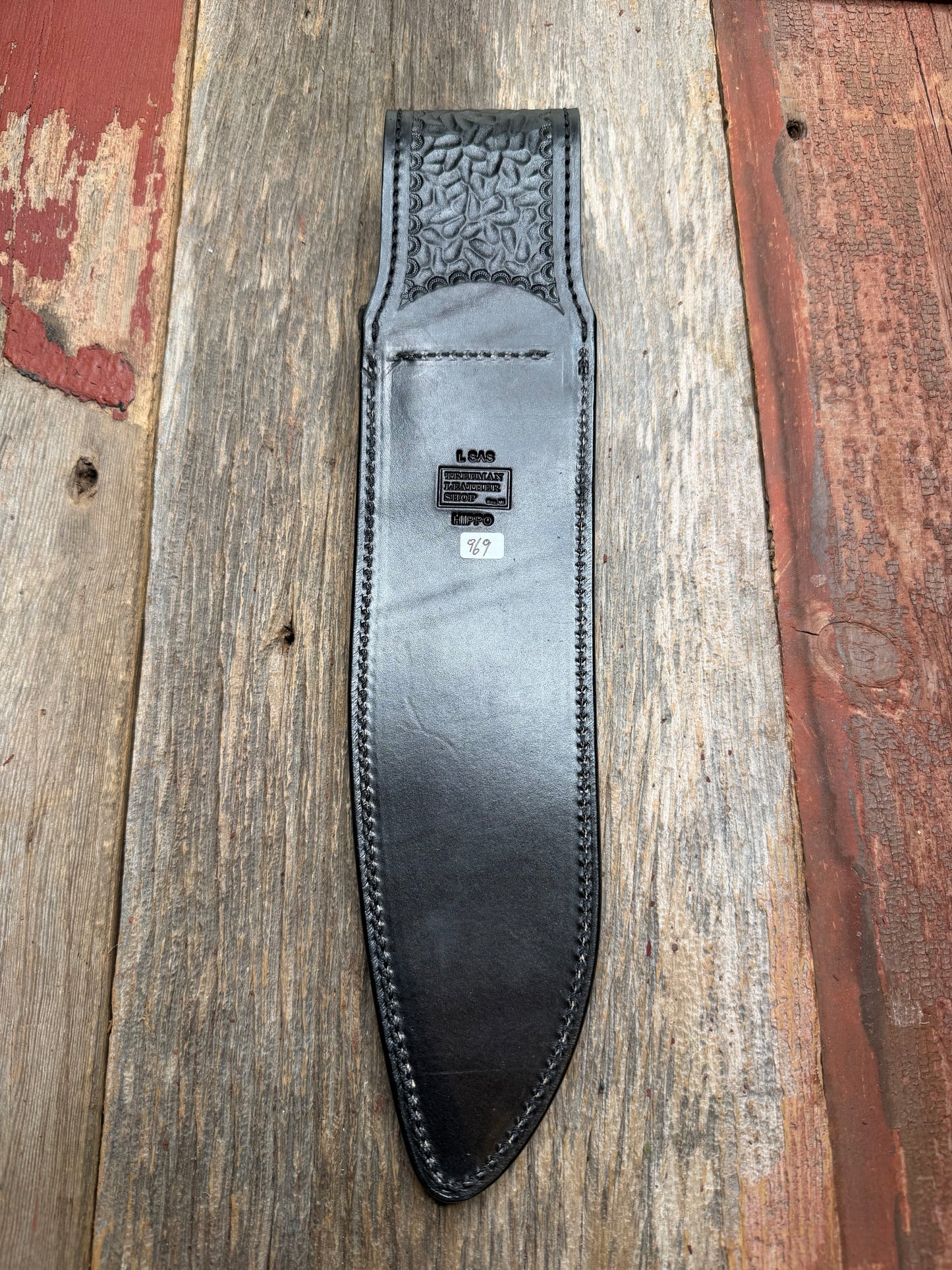 Randall Model 12-11 Large Sasquatch in Black Hippo, forward curved hilt, black Canteen Snap, full brass stamping and stitching.