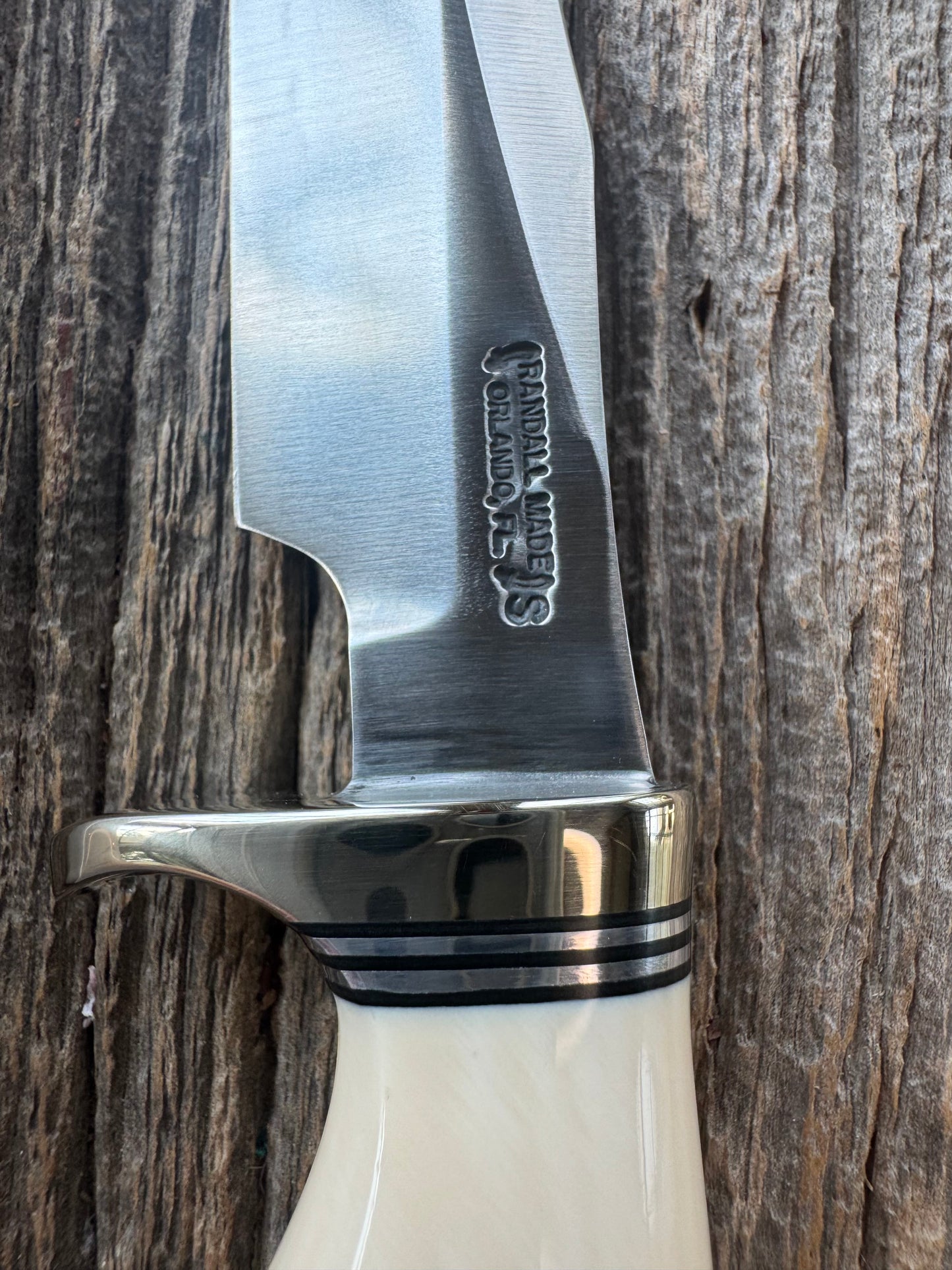 New in paper Randall Model 8-4 with a nice piece of customer supplied Dave Warthers Resin with a single finger grip. Stainless Steel, Nickel Silver Single Hilt and a raw natural end.