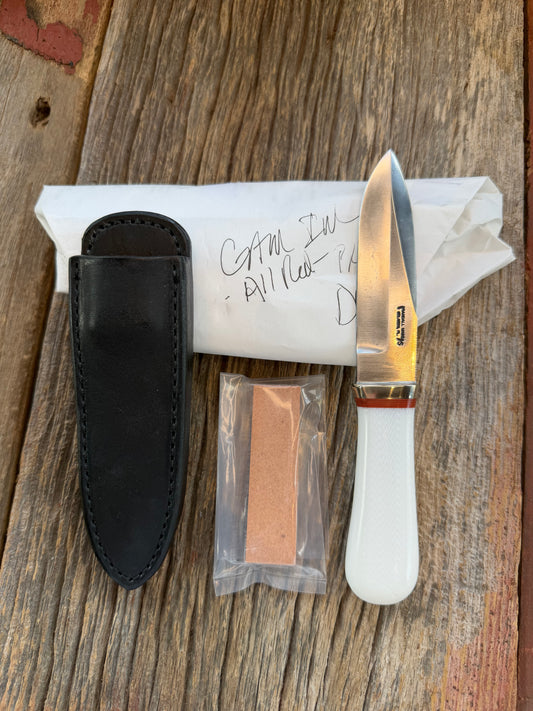 New in Paper Randall Model “Gambler” 4 Inch in Ivorite Nickel hilt, Stainless, red single spacer.