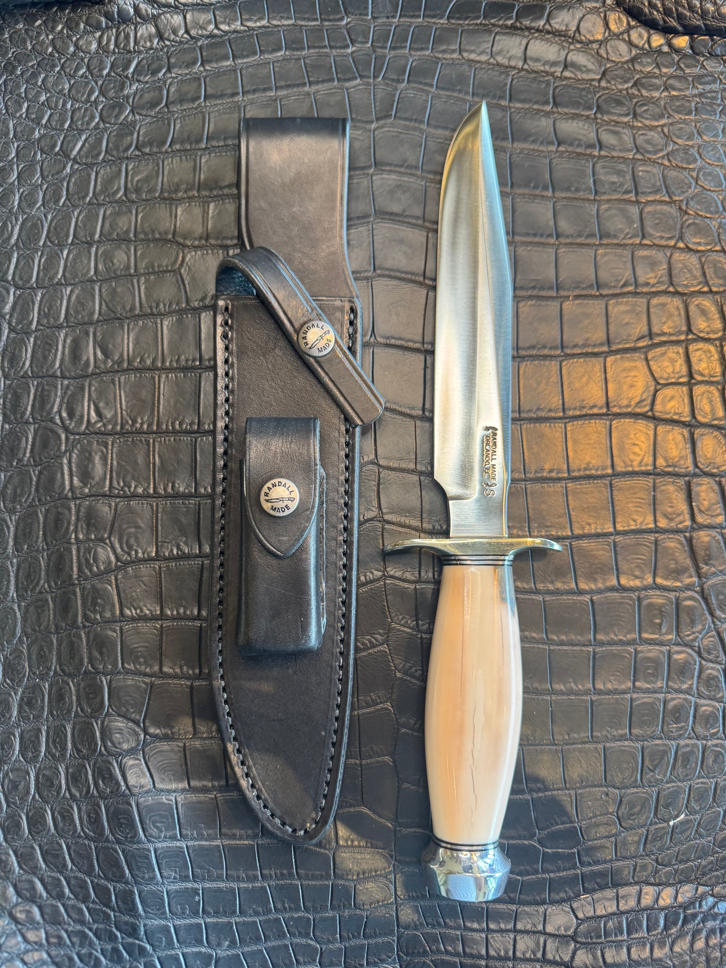 Randall Model 1-7 in Creamy Fossil Walrus Ivory. Nickel Silver Hilt and Aluminum Flanged Butt cap. ( slight crack)