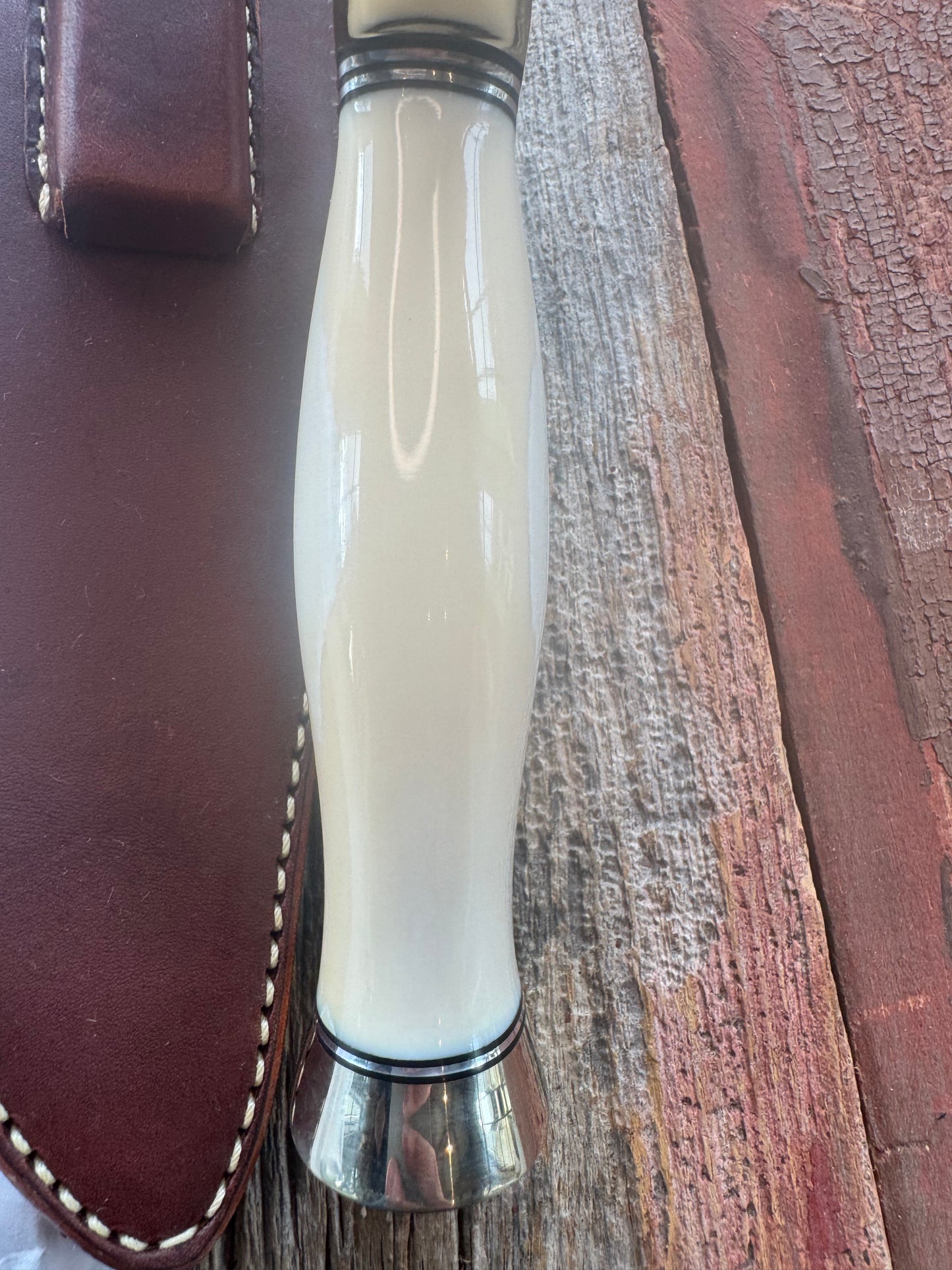 New in Paper Model 12-11 Confederate Bowie. Beautiful creamy Fossil Walrus Ivory with a Nickel  Silver forward curved hilt and butt cap. Unreal Scrim opportunity!! Blank Canvas..