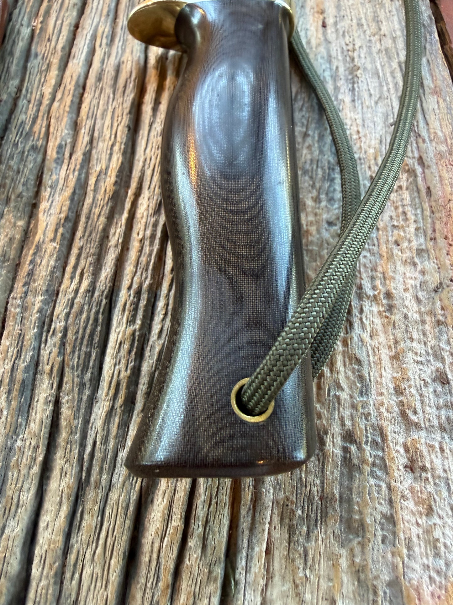Nice Randall Model 28 Woodsman in Black Micarta. SS blade, brass single hilt. Lanyard. Brown leather sheath.