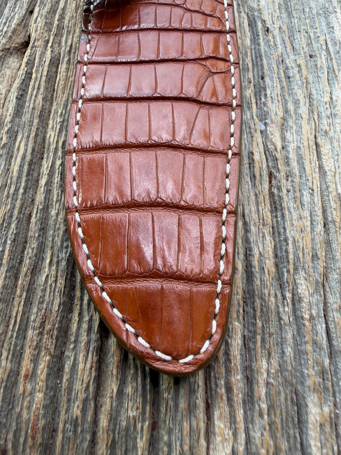 New Randall Model 1-6 Sheath in Exotic thick and textured Honey Crocodile skin on brown leather from Treeman with a silver Canteen snap. Hand tooled belt loop. Killer sheath.