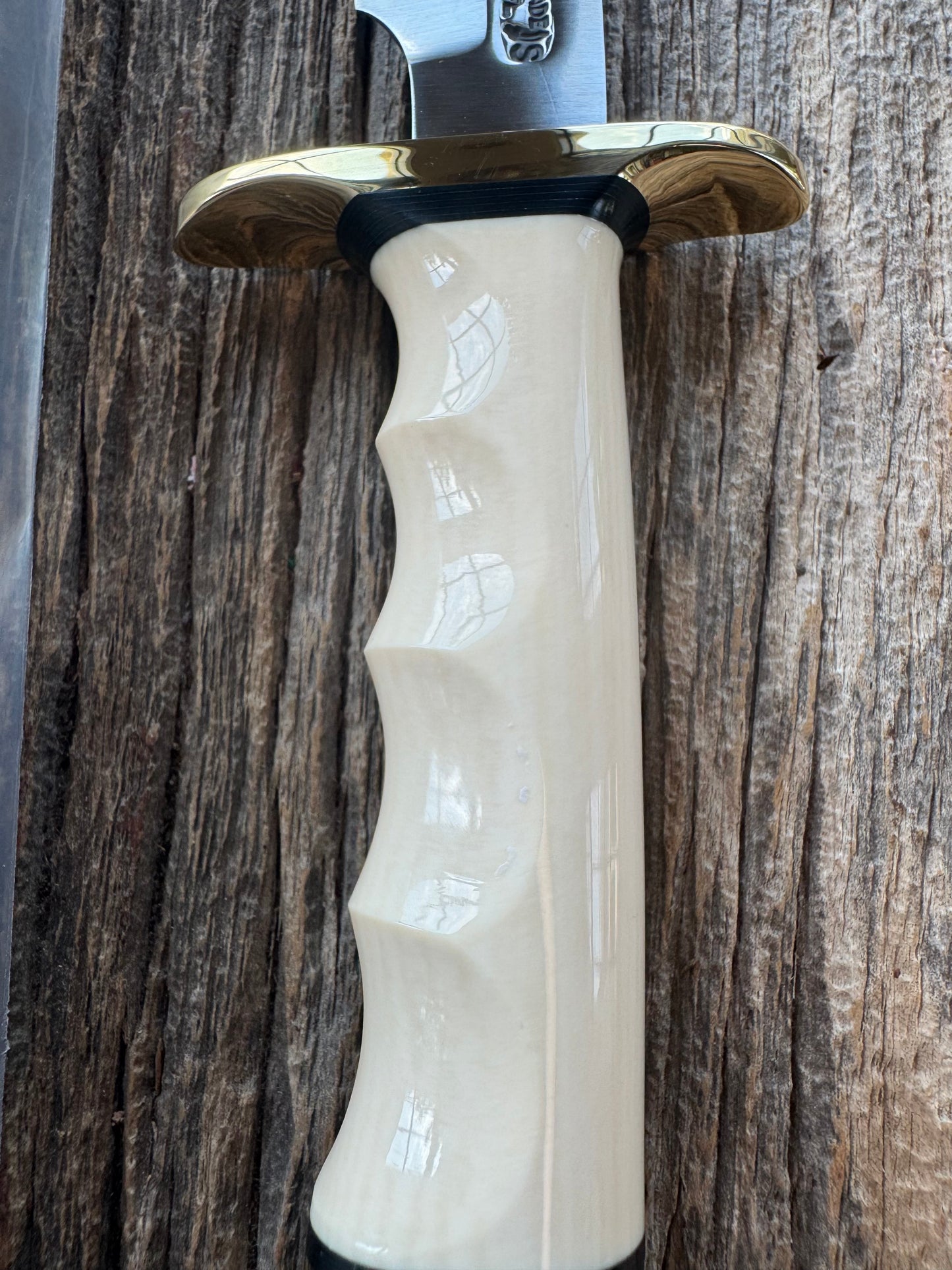 New in paper Randall Model Combat Companion with a nice piece of customer supplied Warthers Resin with finger grooves. Teeth, Stainless Steel, Brass Hilt and brass butt cap.