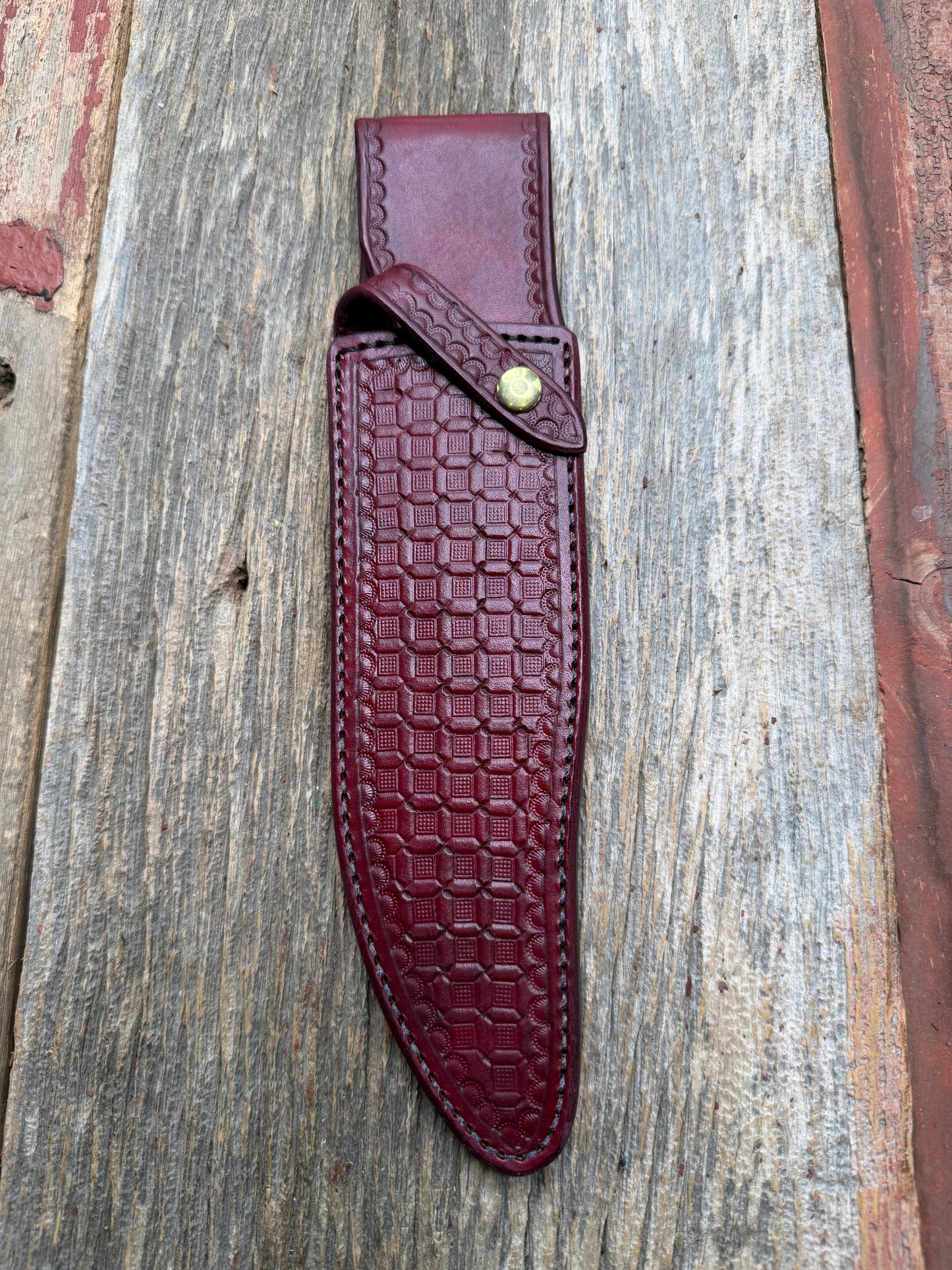 Randall Model 12-8 “Big Bear” sheath in Ox Blood Red stamped leather from Sullivans by Gutcher. Parquet window pattern, mesmerizing !!