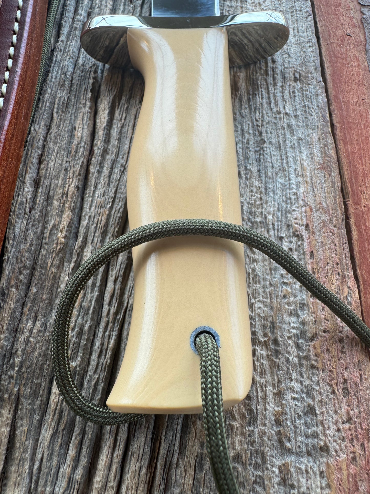 Randall Model 16-7 in Tan Micarta. Nickel Silver Hilt, Stainless steel and Lanyard. New in Paper.