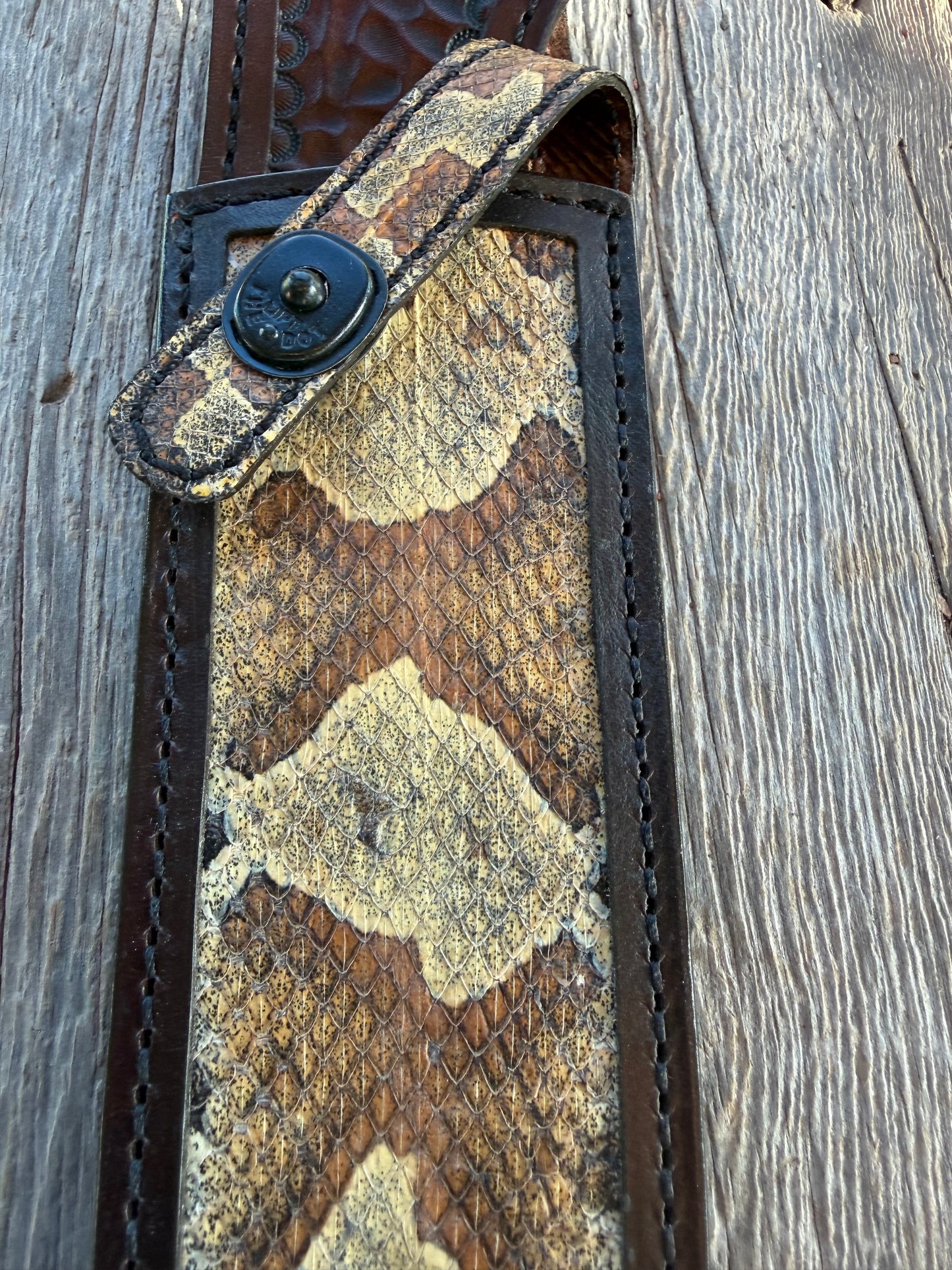 New Randall Model Clinton Special Sheath in Exotic Southern Copperhead from Treeman Sheaths. Black Canteen Snap. Stunning colors and pattern. Very rare skin.