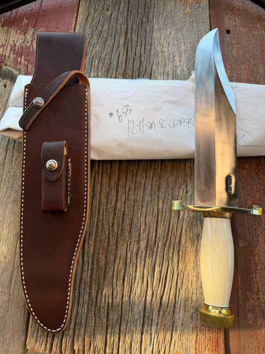 New in Paper Model 12-11 Smithsonian “ Smitty” Beautiful Dave Warthers Resin with a Brass Lugged hilt and Scalloped brass collar and scalloped coolie butt cap.