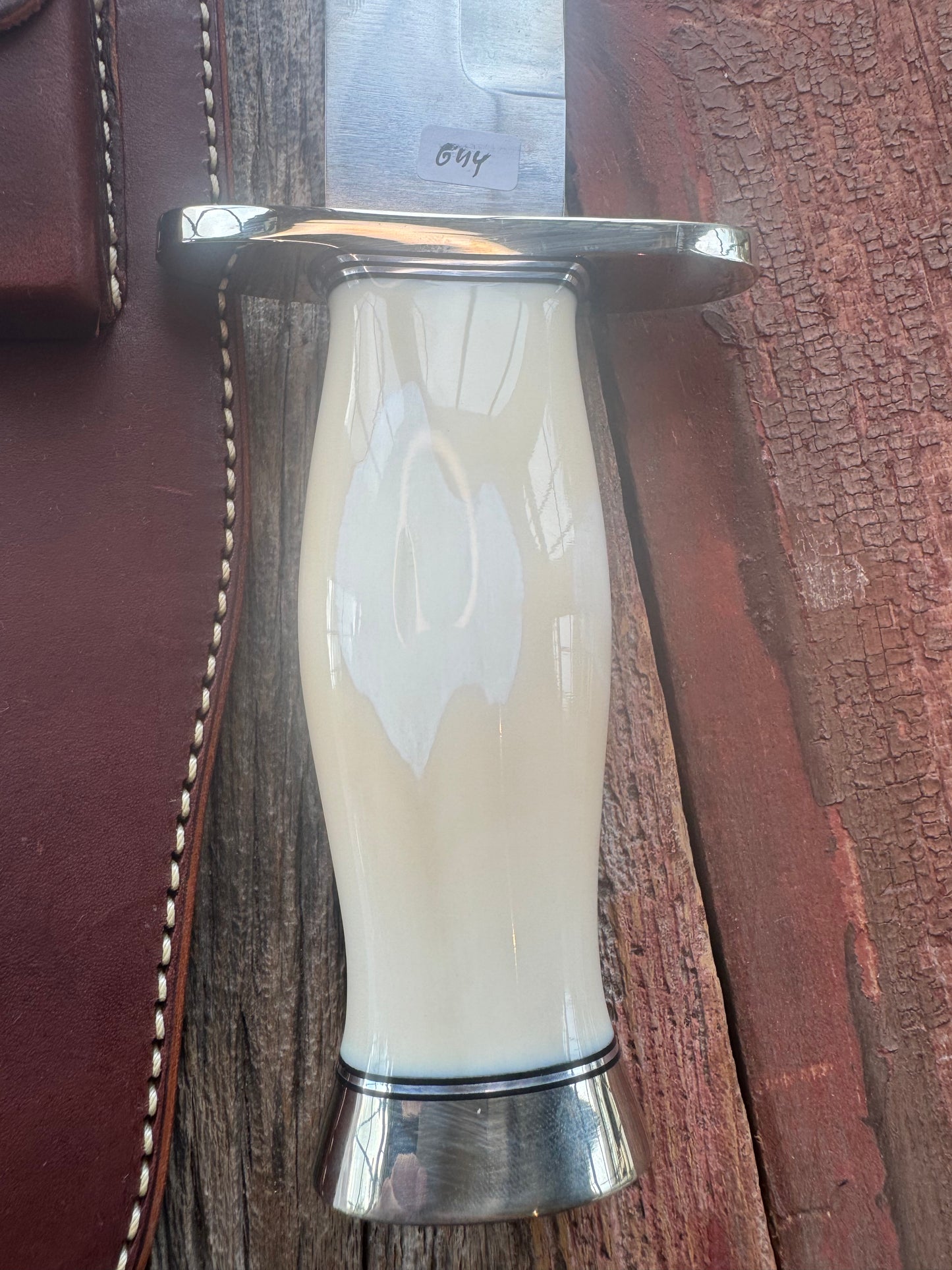 New in Paper Model 12-11 Confederate Bowie. Beautiful creamy Fossil Walrus Ivory with a Nickel  Silver forward curved hilt and butt cap. Unreal Scrim opportunity!! Blank Canvas..