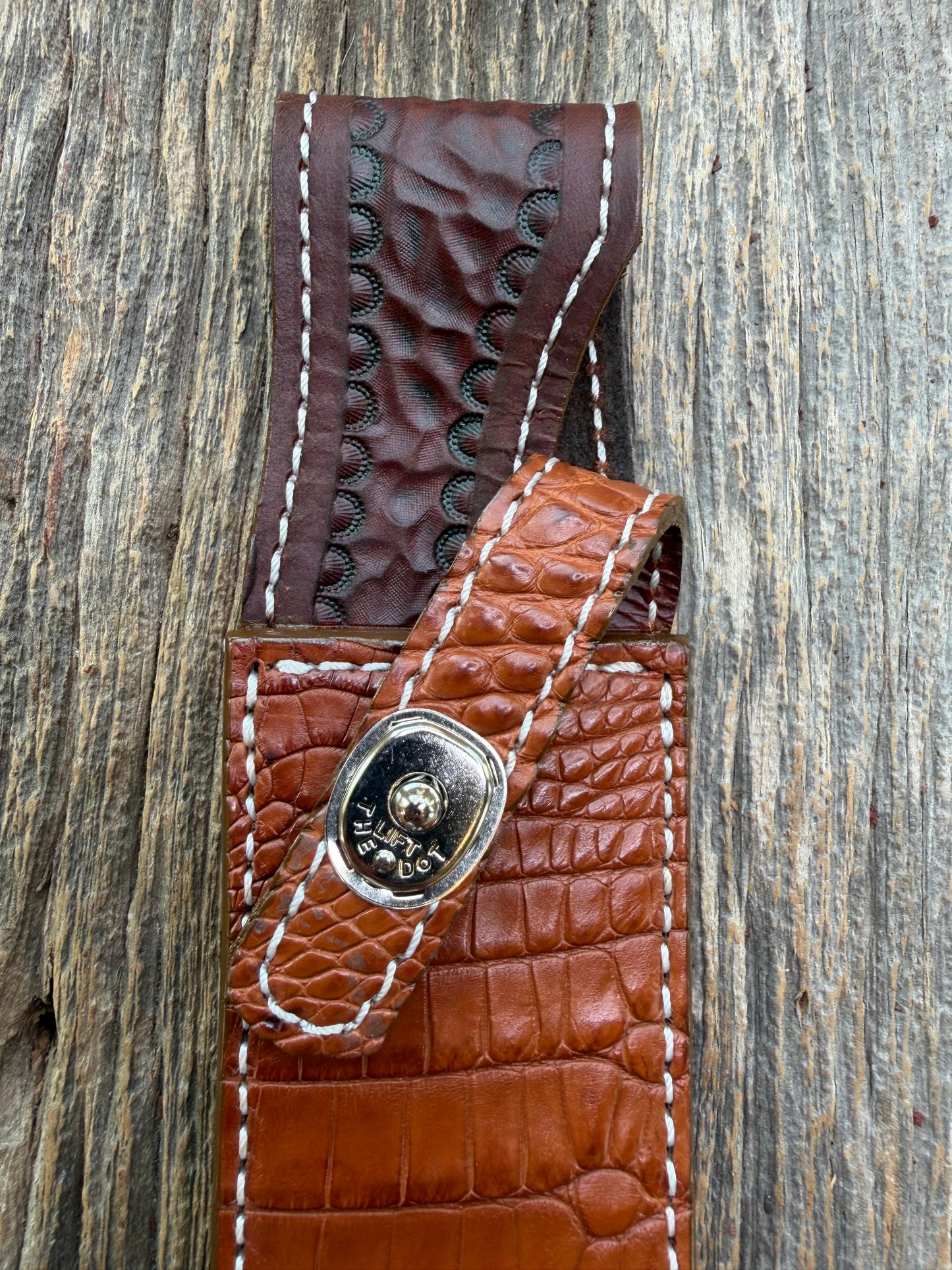 New Randall Model 1-8 Sheath in Exotic thick and textured Honey Crocodile skin on brown leather from Treeman with a silver Canteen snap. Hand tooled belt loop. Killer sheath.