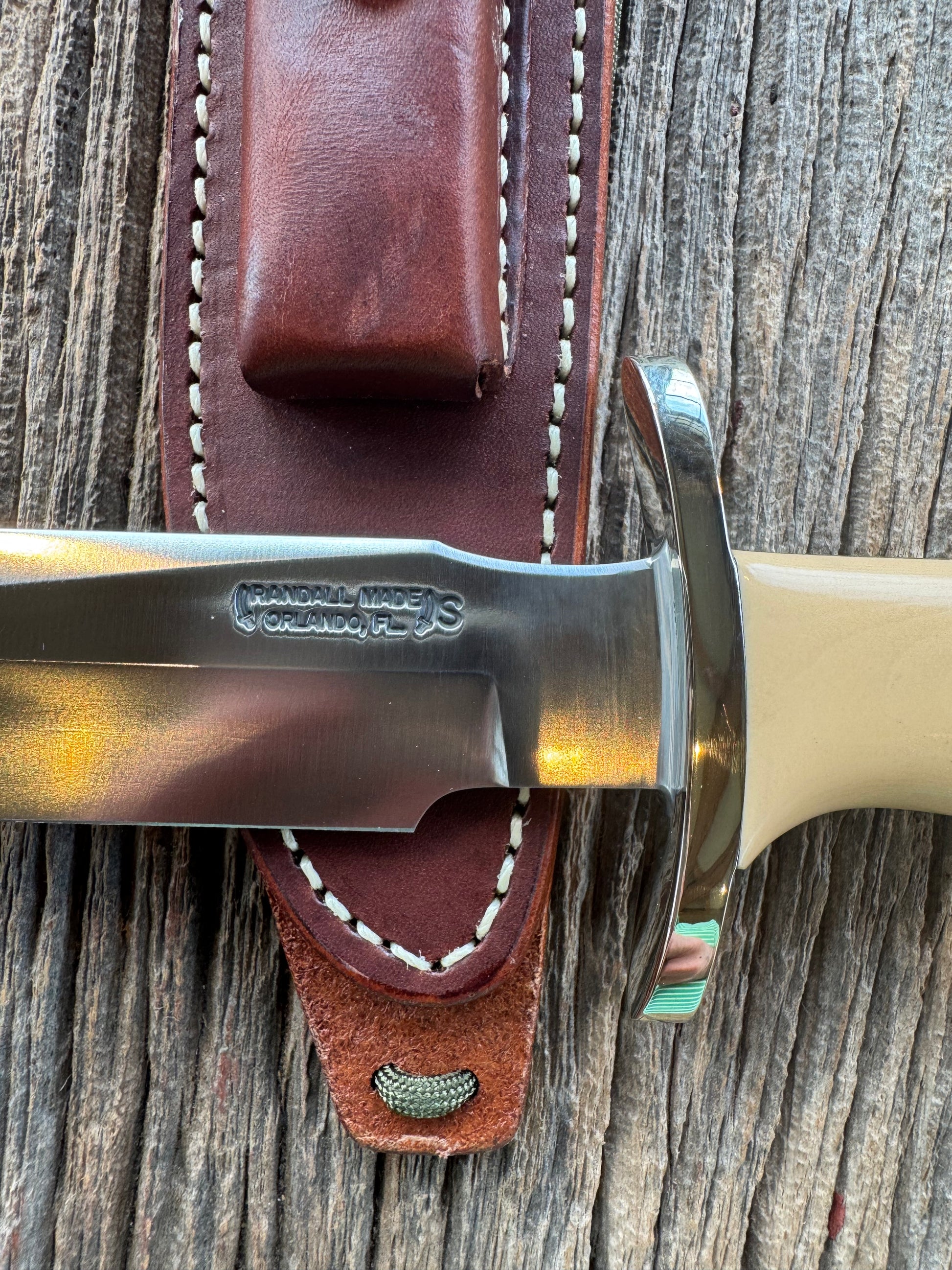 Randall Model 16-7 in Tan Micarta. Nickel Silver Hilt, Stainless steel and Lanyard. New in Paper.