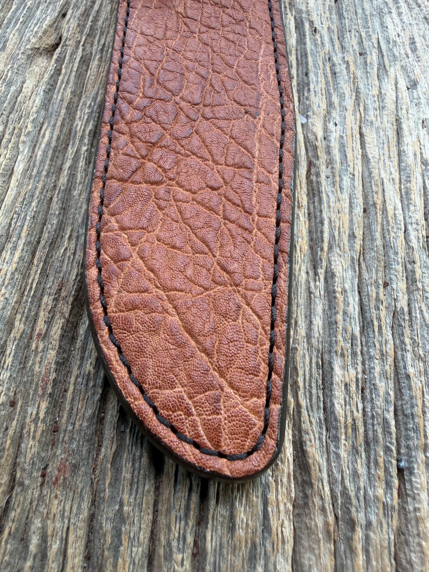 New Randall Model 1-8 Sheath in Exotic thick and textured Rust colored Elephant hide on brown leather from Treeman with a black Canteen snap. Hand tooled belt loop. Killer sheath.