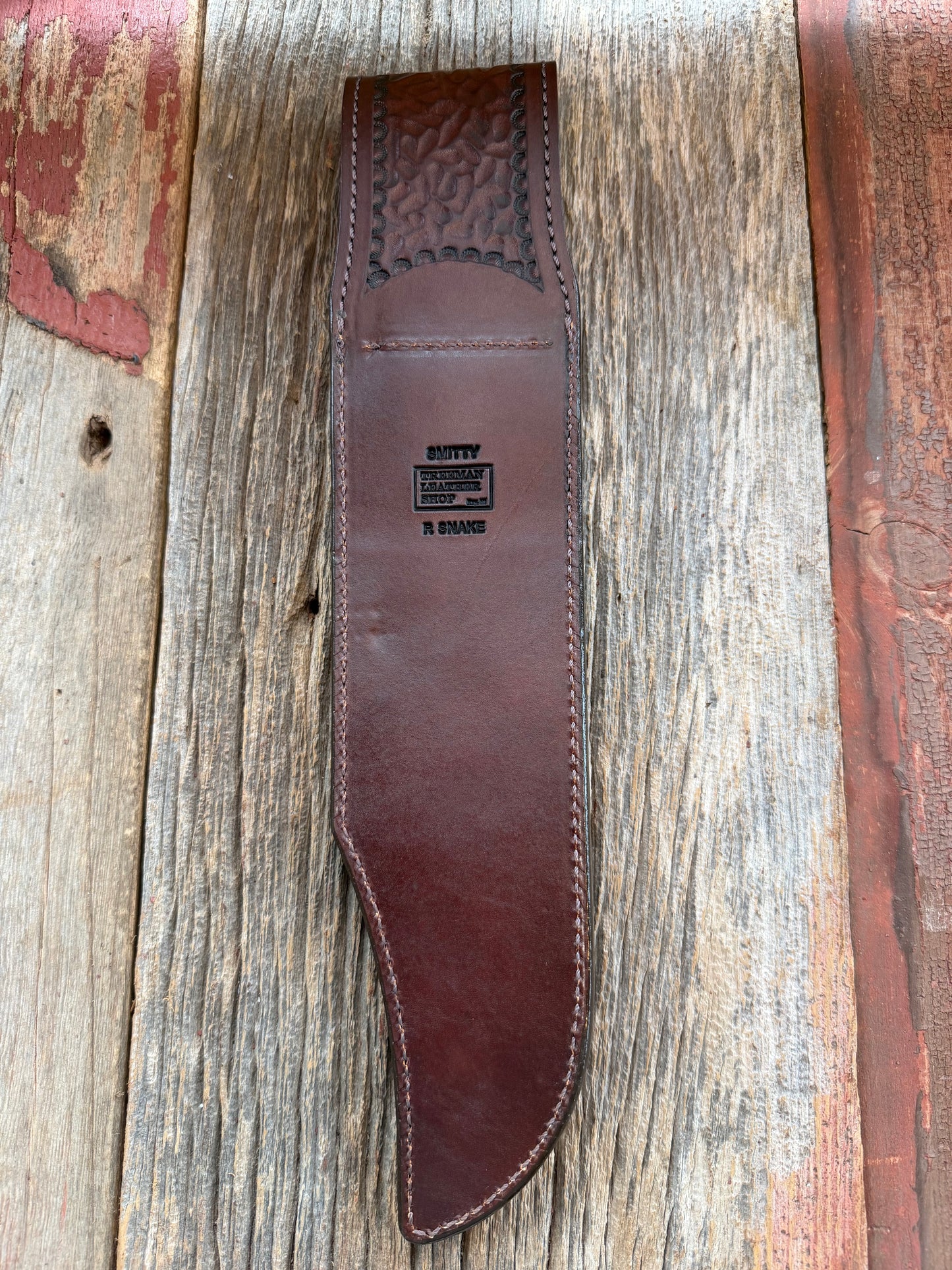 Randall Model 12-11 Smitty Sheath in Exotic Canebreak RattleSnake with the original Rattles tail made into the strap. An absolute gem 1/1 from Treeman Sheaths. Tremendous colors on this one.