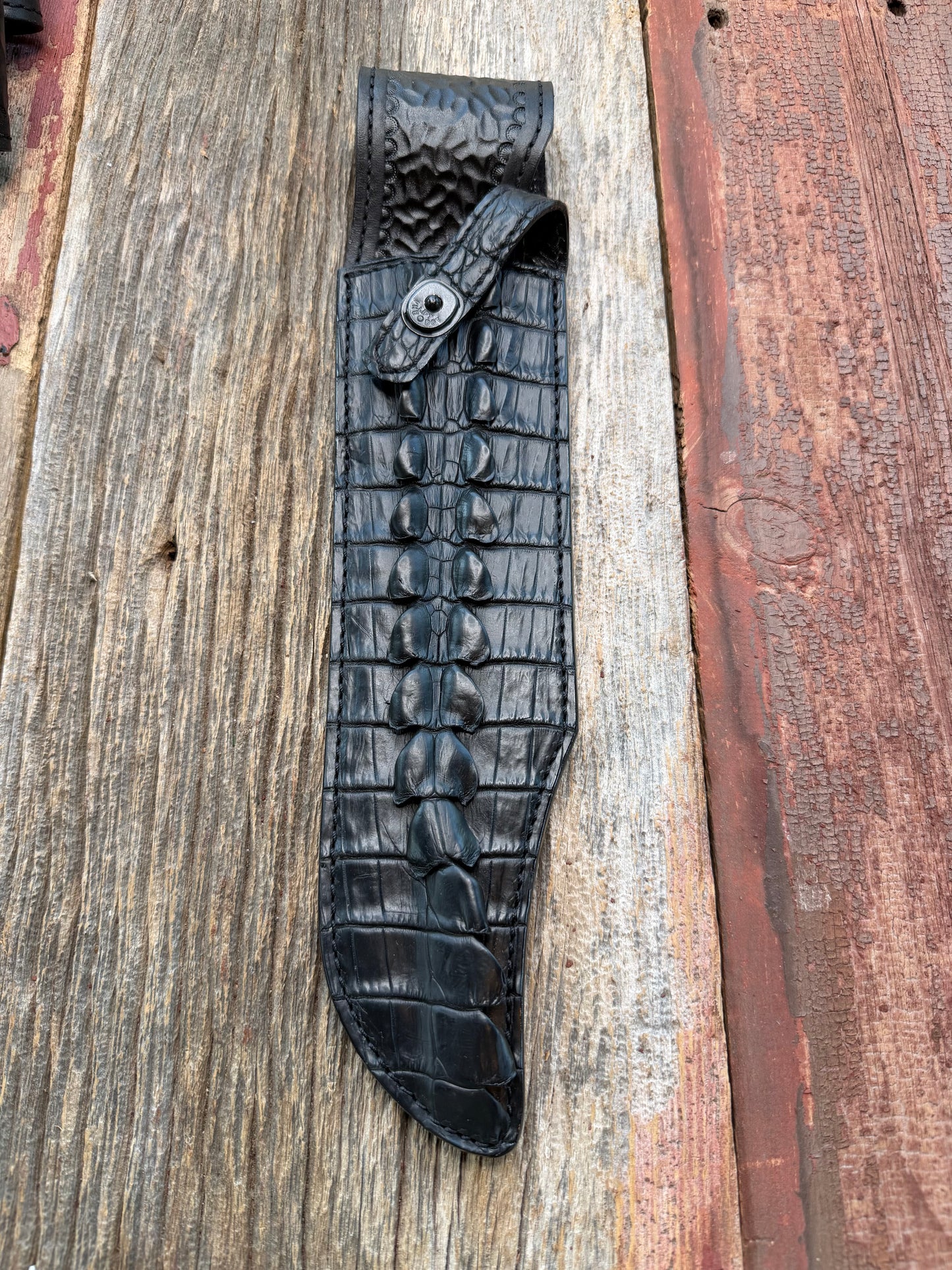 New Randall Model 12-11 Smitty Sheath in Exotic Black Matte Crocodile Tail from Treeman with the newest Black Canteen snap. Killer sheath.