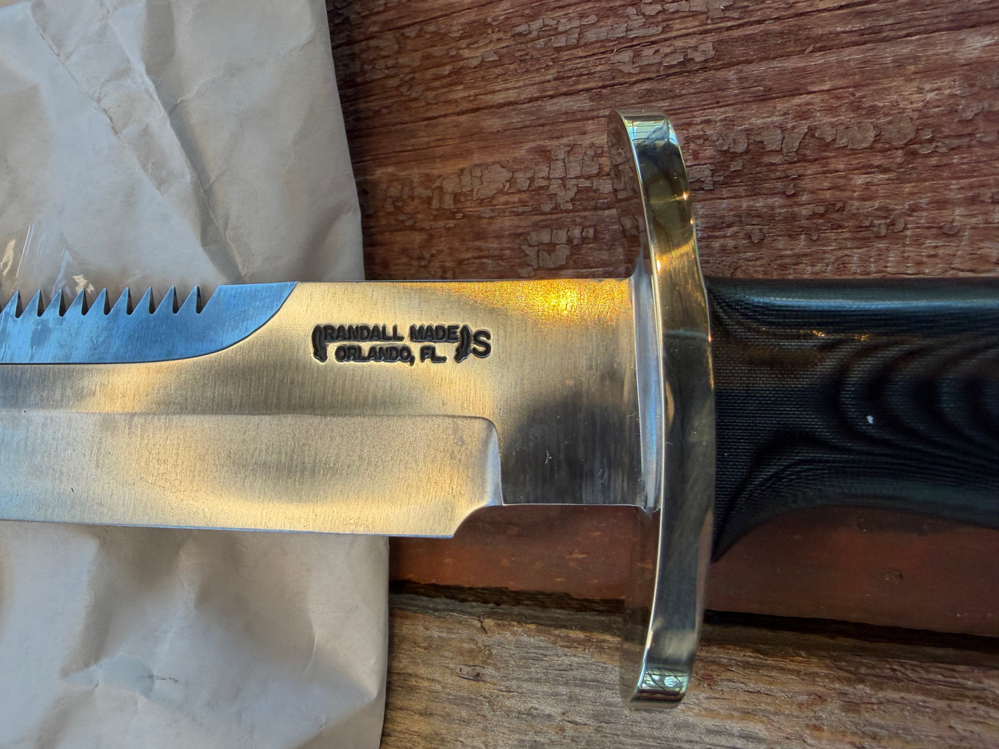 New in Paper Randall Model 14-7.5 in Black Micarta handle, Nickel Silver Hilt, Stainless steel, Sawteeth and Lanyard.