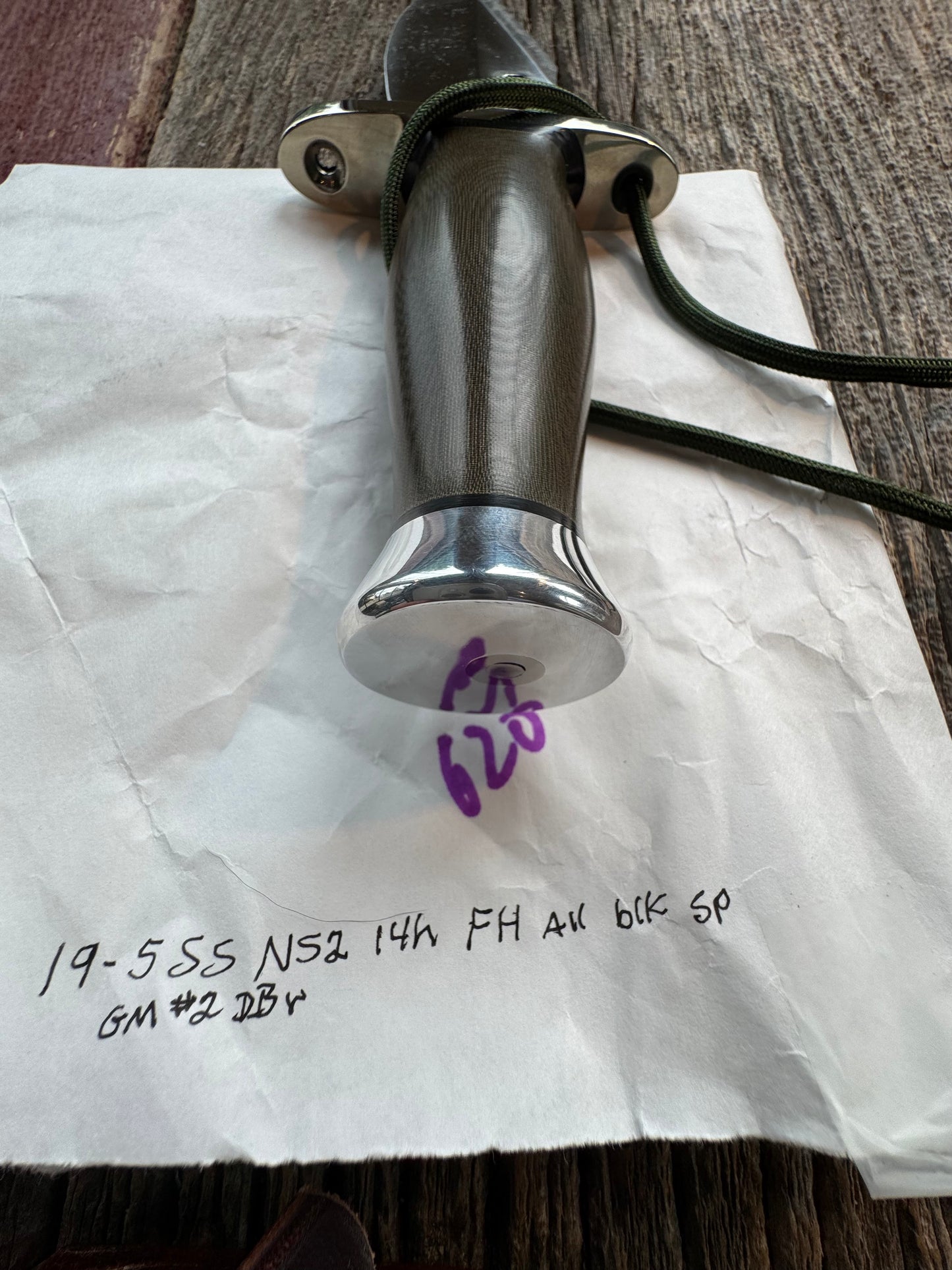 New in Paper Randall Model 19-5 Bushmaster with an Green Micarta handle. SS blade, Nickel silver single hilt. Lanyard. Brown leather sheath.