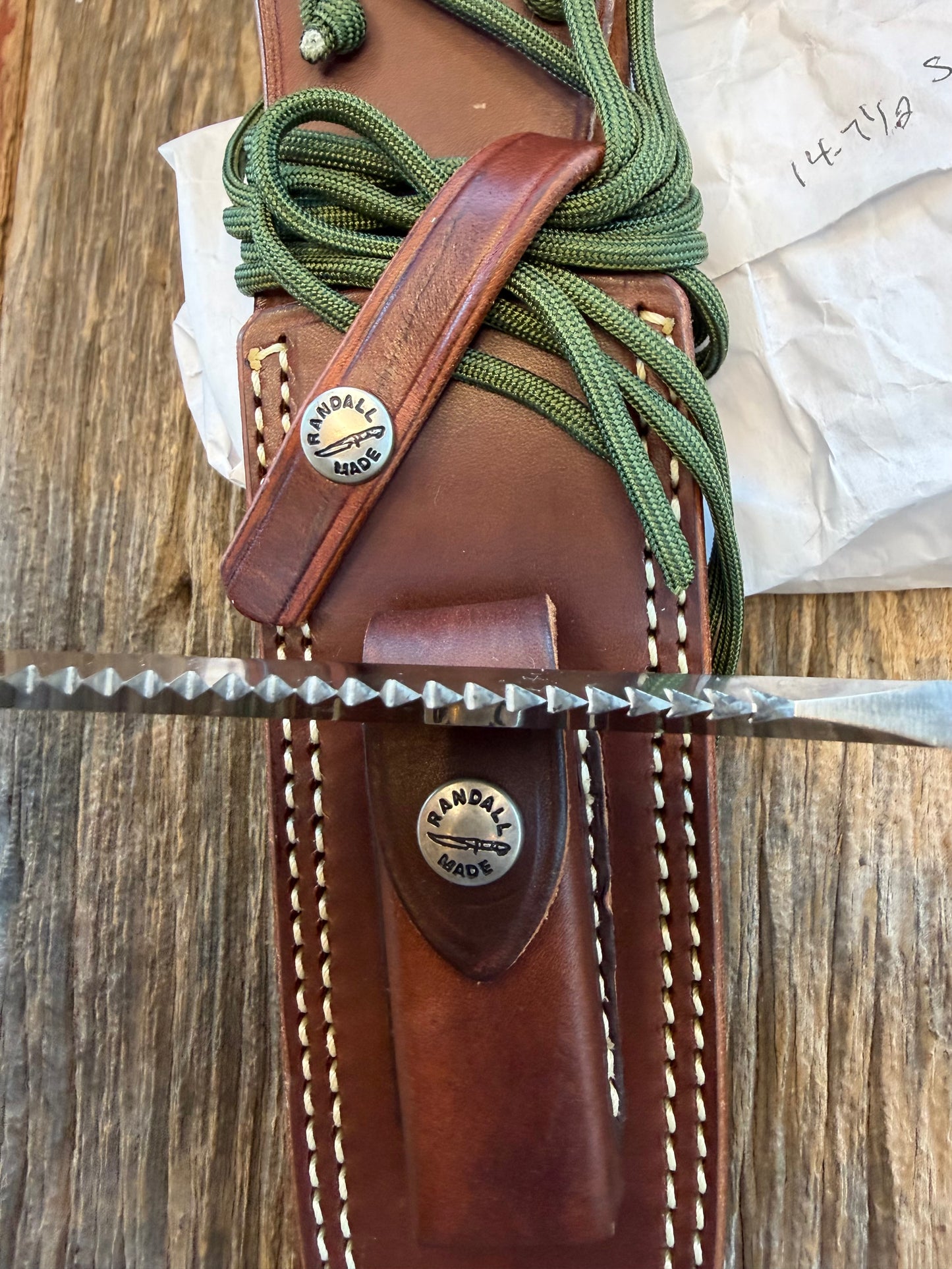 New in Paper Randall Model 14-7.5 in Black Micarta handle, Nickel Silver Hilt, Stainless steel, Sawteeth and Lanyard.