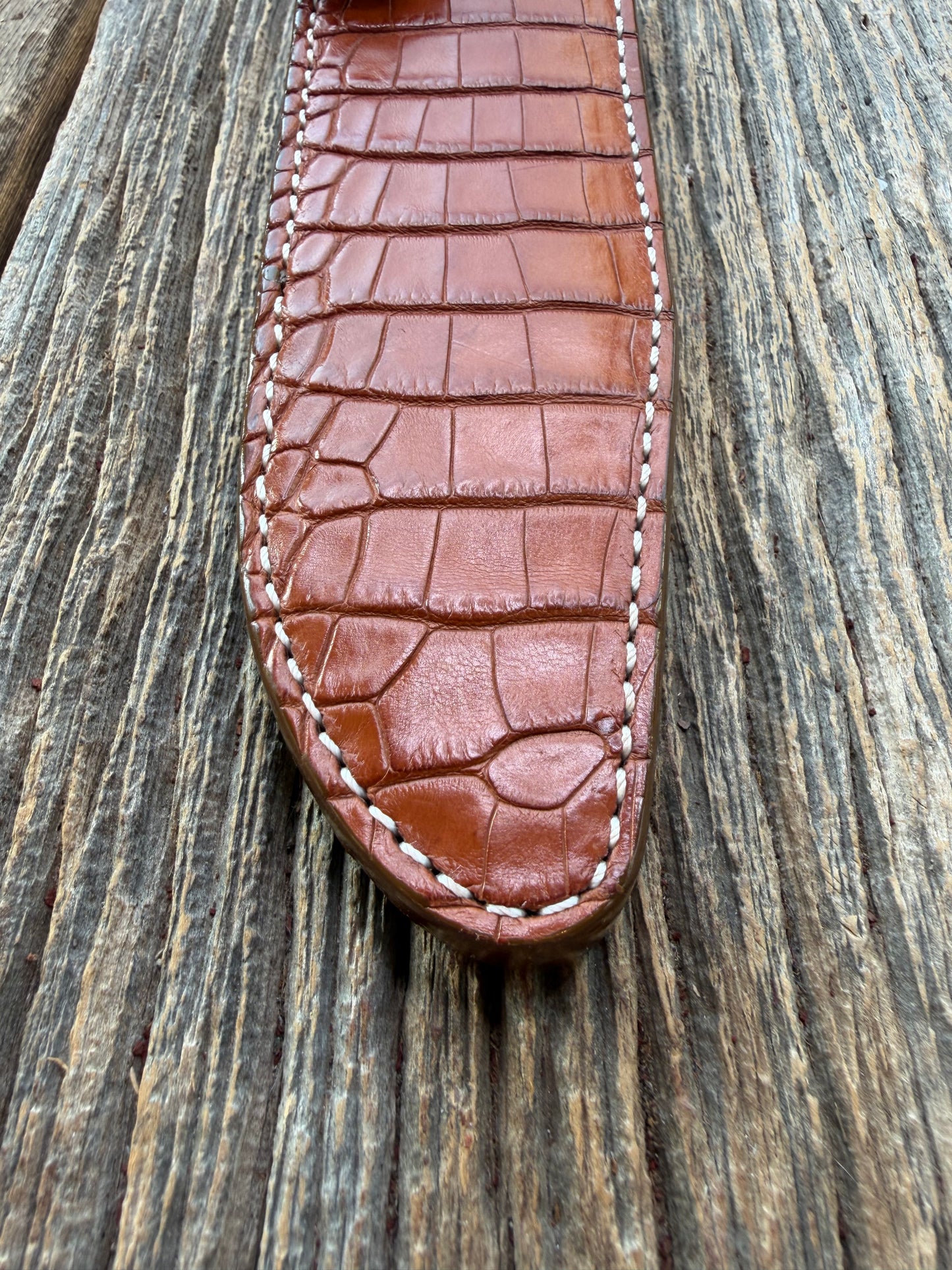 New Randall Model 1-7 Sheath in Exotic thick and textured Honey Crocodile skin on brown leather from Treeman with a silver Canteen snap. Hand tooled belt loop. Killer sheath.