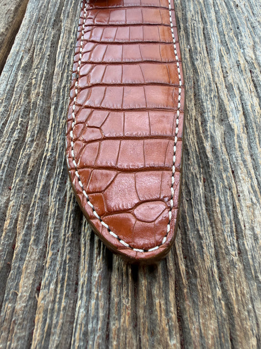 New Randall Model 1-7 Sheath in Exotic thick and textured Honey Crocodile skin on brown leather from Treeman with a silver Canteen snap. Hand tooled belt loop. Killer sheath.
