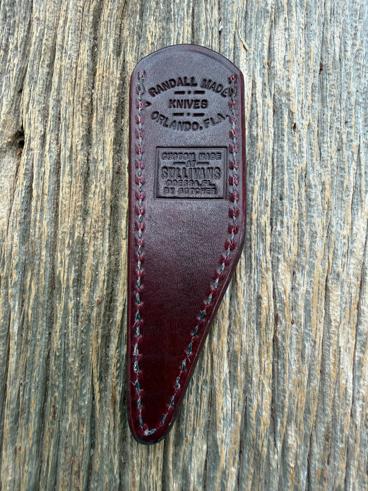 Rare Randall Sullivans by Gutcher Knife Sheath for a Model Tailor. Ox Blood Red leather with a beautiful shell stamp pattern. Randall stamp on the back.