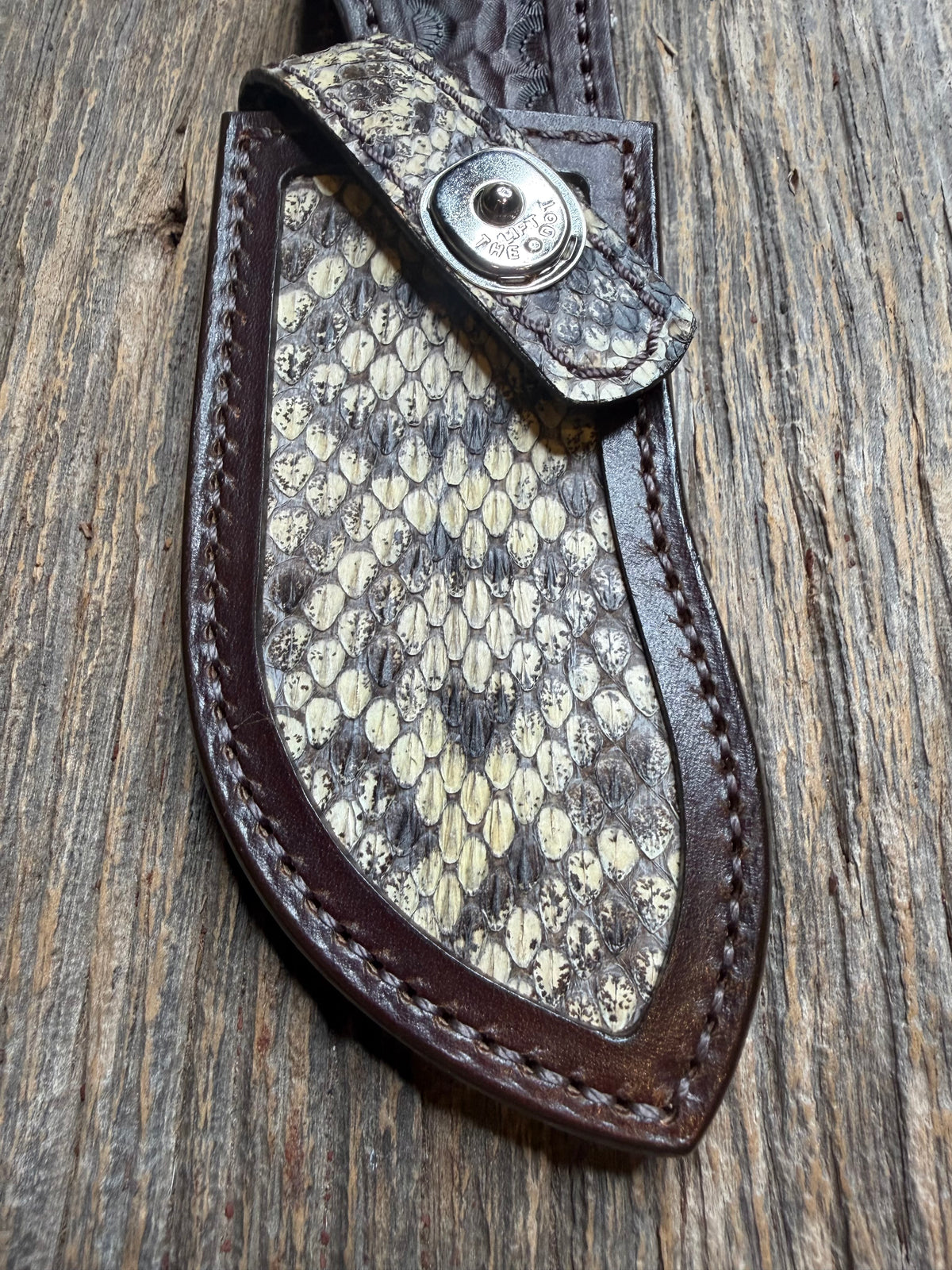 Randall Model Bowles Special sheath with an Eastern Diamondback RattleSnake skin from Treeman Sheaths. Hand tooled belt loop, canteen snap. Vibrant colors and one of the hardest skins to source.
