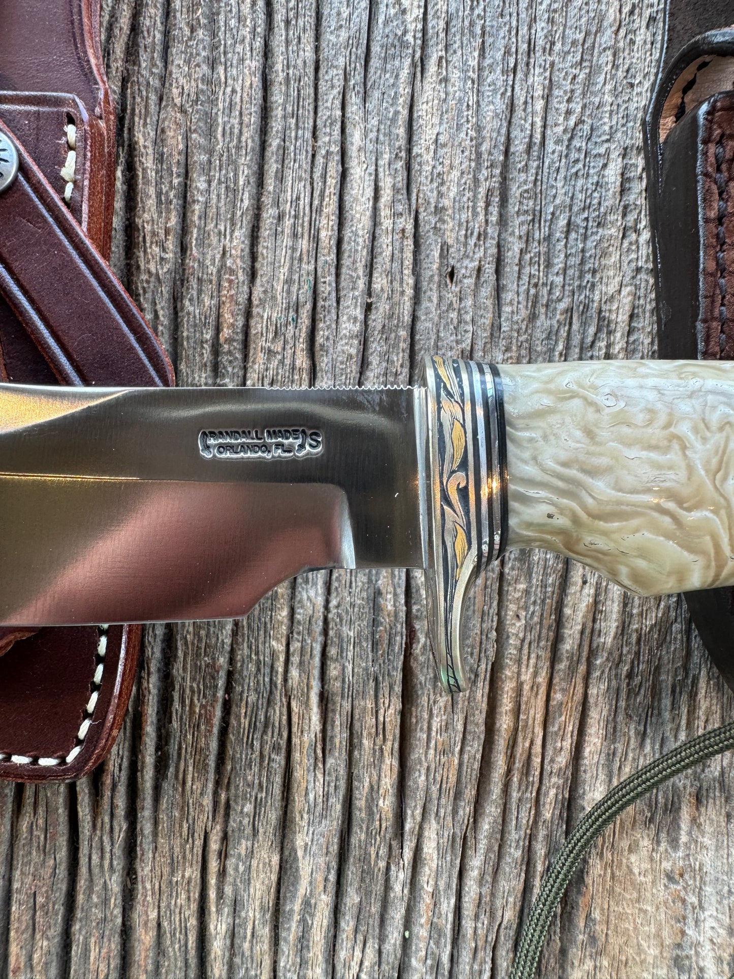 Randall Model Bowles Skinner Dealer Special Knife, perfect Musk Ox. This knife is a one of 4 per Rick Bowles. Beautifully engraved by Jere Davidson and adorned with gold and silver inlays.