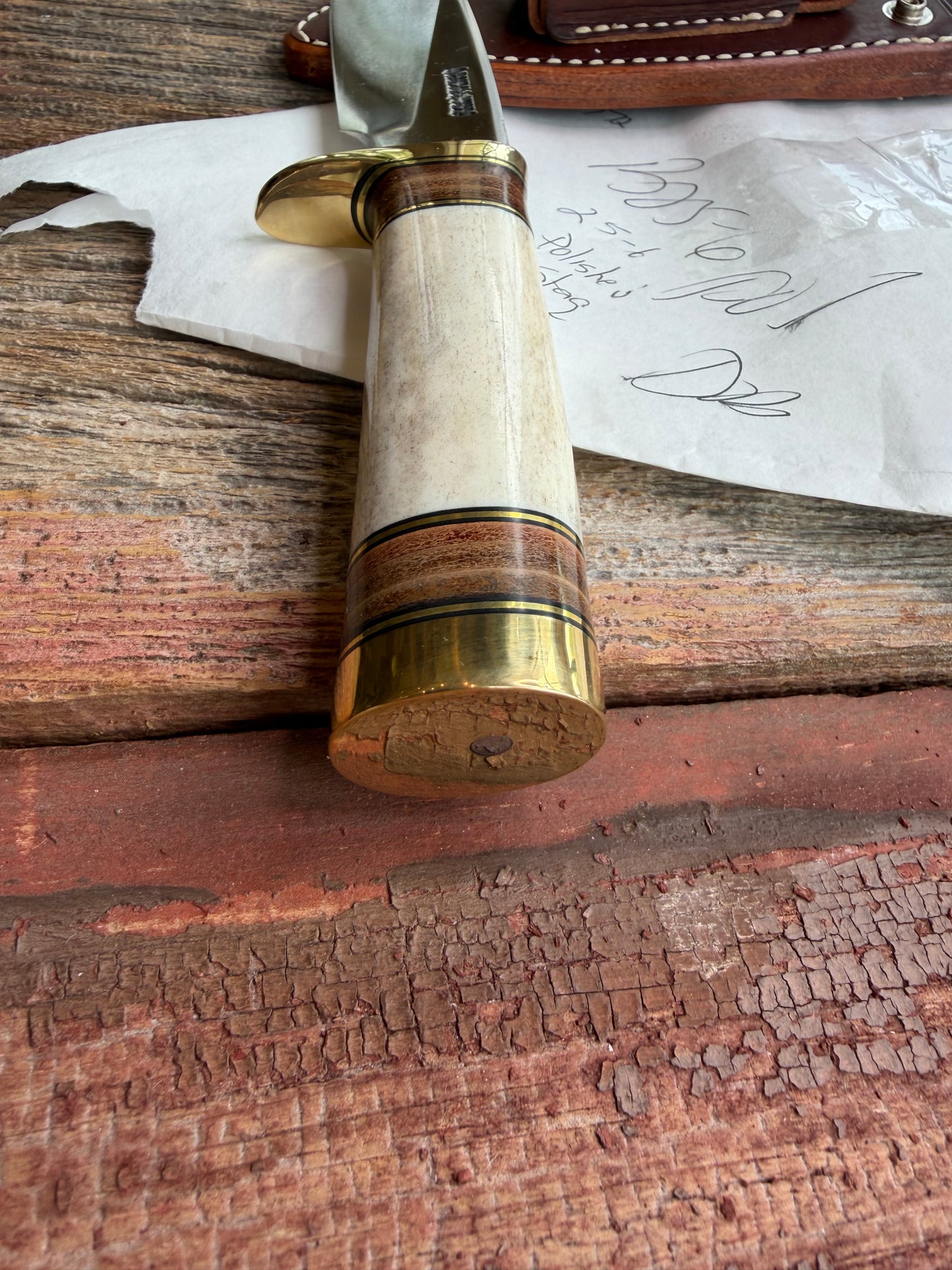 New in paper Randall Knife Model 25-6 Trapper in Polished Stag Leather Handle Stainless Blade, brass Hilt
