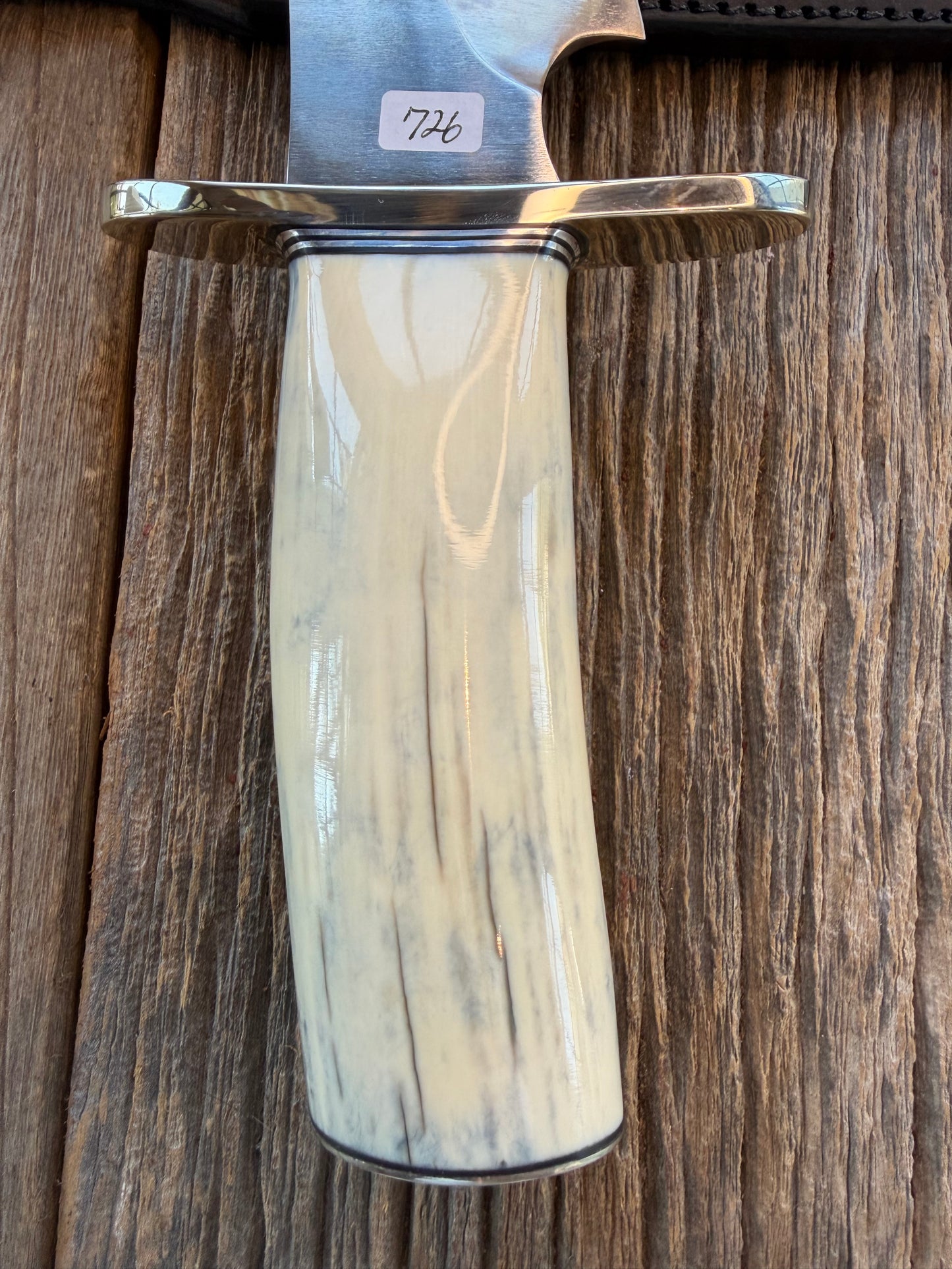 New in Paper Randall Model 12-11 Dealer Special Large Sasquatch Huge piece of Pearly White/Blue Fossil Walrus Ivory, # 1135 Nickel Silver Hilt and butt cap, nickel nameplate.