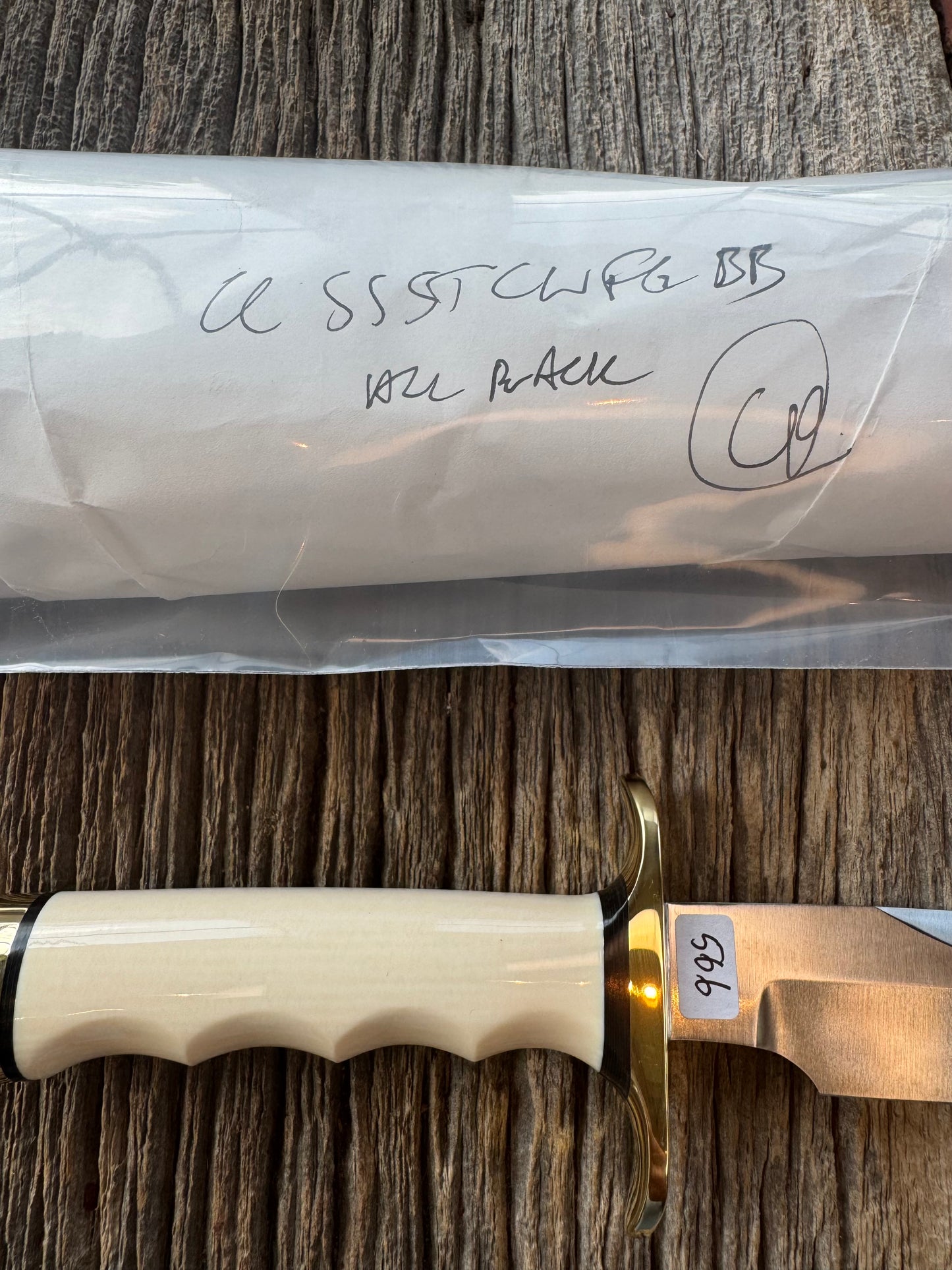 New in paper Randall Model Combat Companion with a nice piece of customer supplied Warthers Resin with finger grooves. Teeth, Stainless Steel, Brass Hilt and brass butt cap.