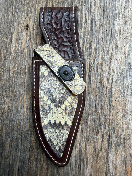 Randall Model 19-5 sheath with an Eastern Diamondback RattleSnake skin from Treeman Sheaths. Hand tooled belt loop, canteen snap. One the hardest skins to source.