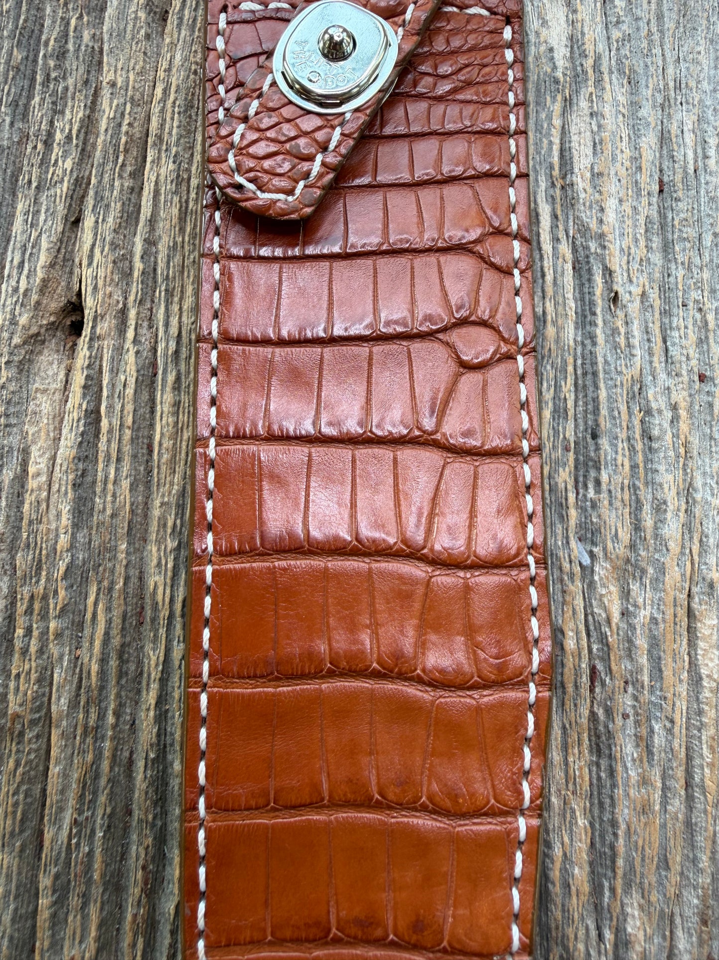 New Randall Model 1-8 Sheath in Exotic thick and textured Honey Crocodile skin on brown leather from Treeman with a silver Canteen snap. Hand tooled belt loop. Killer sheath.