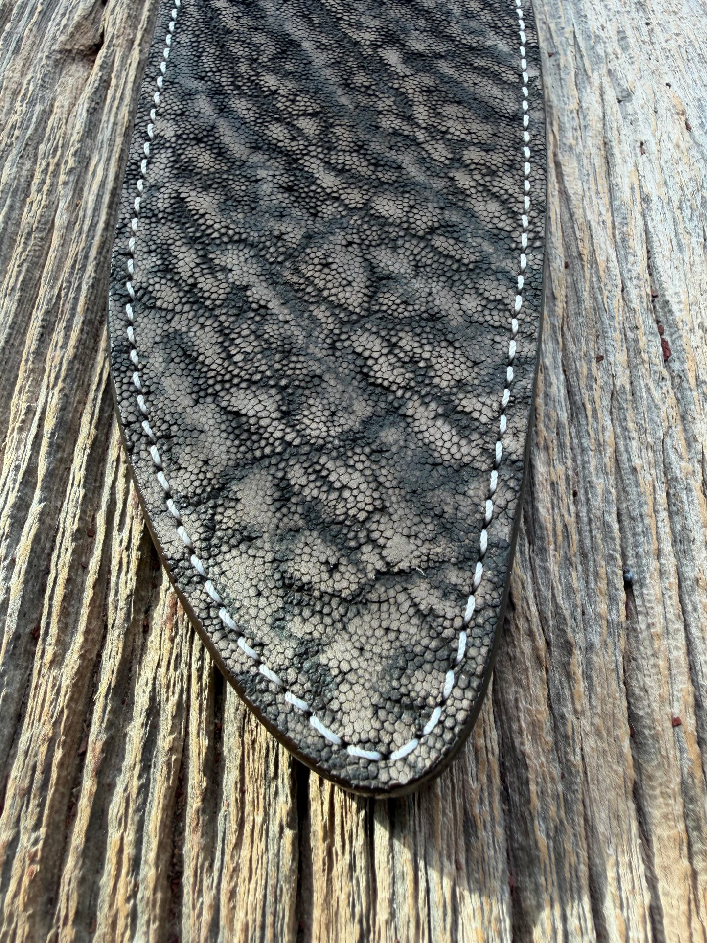 New Randall Model 12-11 Large Sasquatch Sheath in Exotic thick and textured Black and Grey Elephant Ear  on brown leather from Treeman with a black Canteen snap. Hand tooled belt loop. Killer sheath.