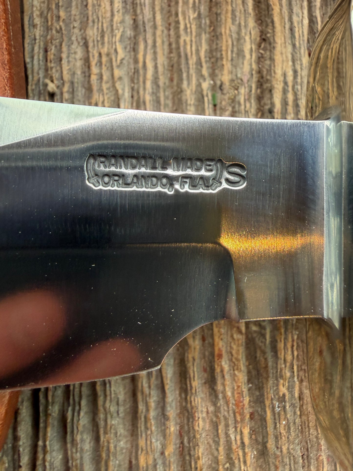 New in Paper Randall Model 19-5 Bushmaster with a Green Micarta handle. Stainless steel blade, Nickel silver hilt. Brown leather sheath. Crows Beak Aluminum handle.