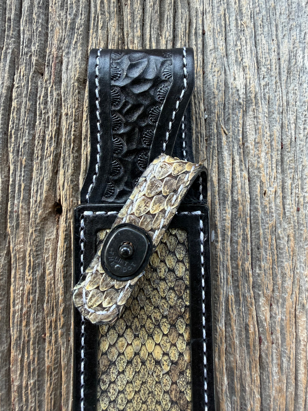 Randall Model 1-7 sheath with inlayed Western Diamondback RattleSnake skin from Treeman Sheaths. Brown leather, white deviated stitching and black canteen snaps.