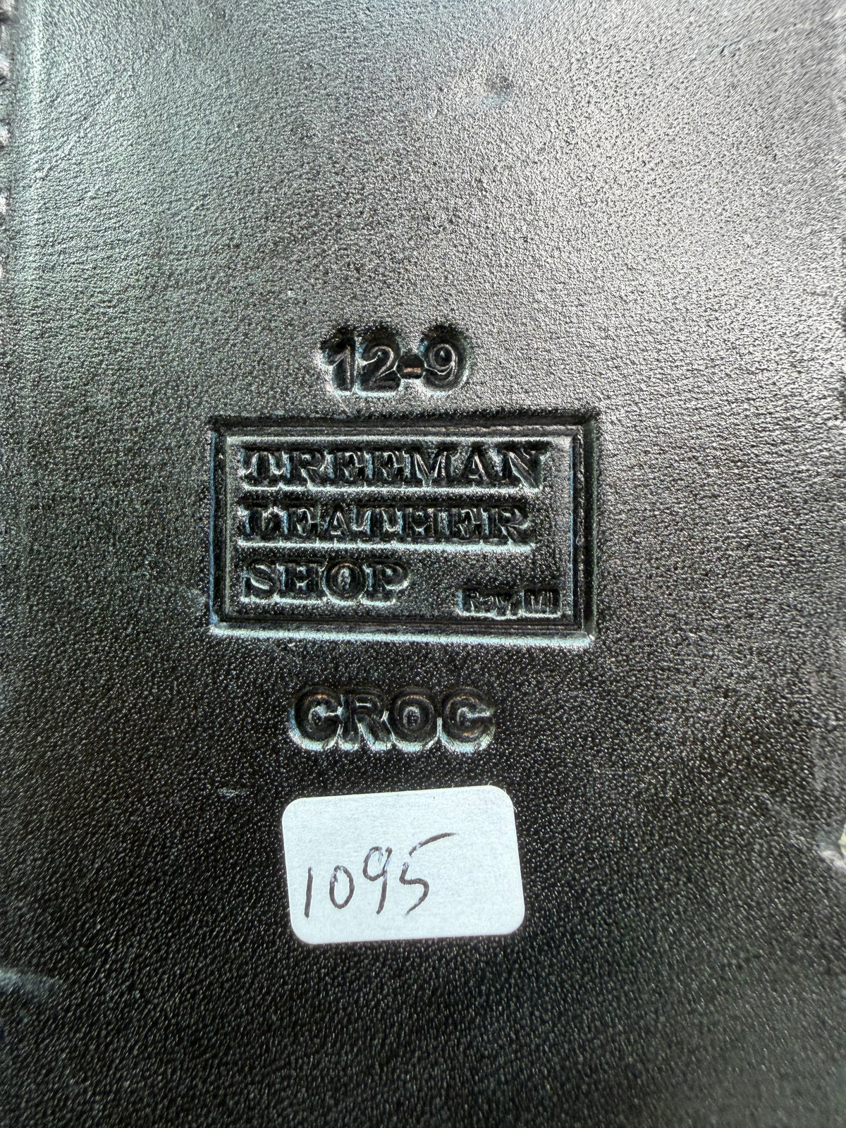 New Randall Model 12-9 Sheath in Exotic Black Matte Crocodile from Treeman with a Black Canteen snap. White thread deviated stitching on black leather..Killer sheath.