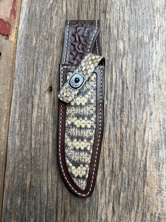 Randall Model 1-6 sheath with an Eastern Diamondback RattleSnake skin from Treeman Sheaths. Hand tooled belt loop, canteen snap. Vibrant colors and one of the hardest skins to source.