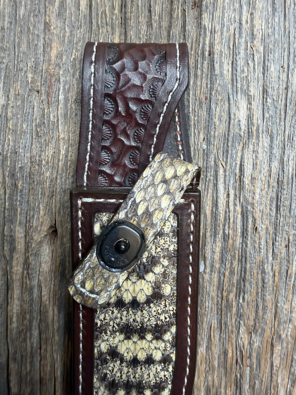 Randall Model 1-6 sheath with an Eastern Diamondback RattleSnake skin from Treeman Sheaths. Hand tooled belt loop, canteen snap. Vibrant colors and one of the hardest skins to source.