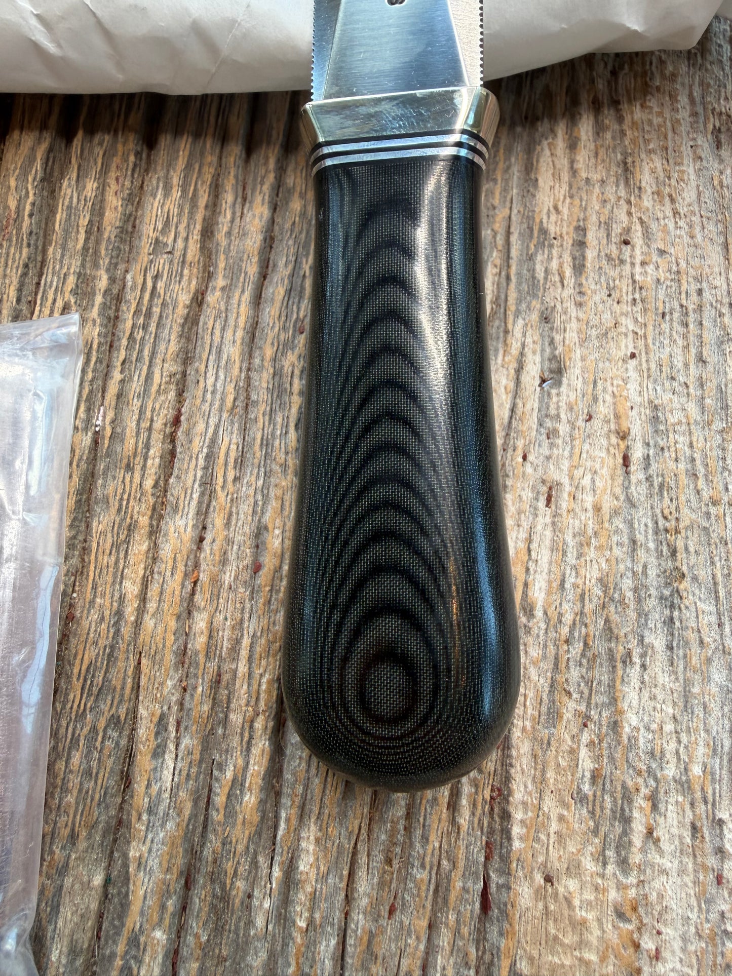 New in Paper Randall Model 24 Guardian in Black Micarta Nickel hilt, Stainless, black and aluminum spacers.