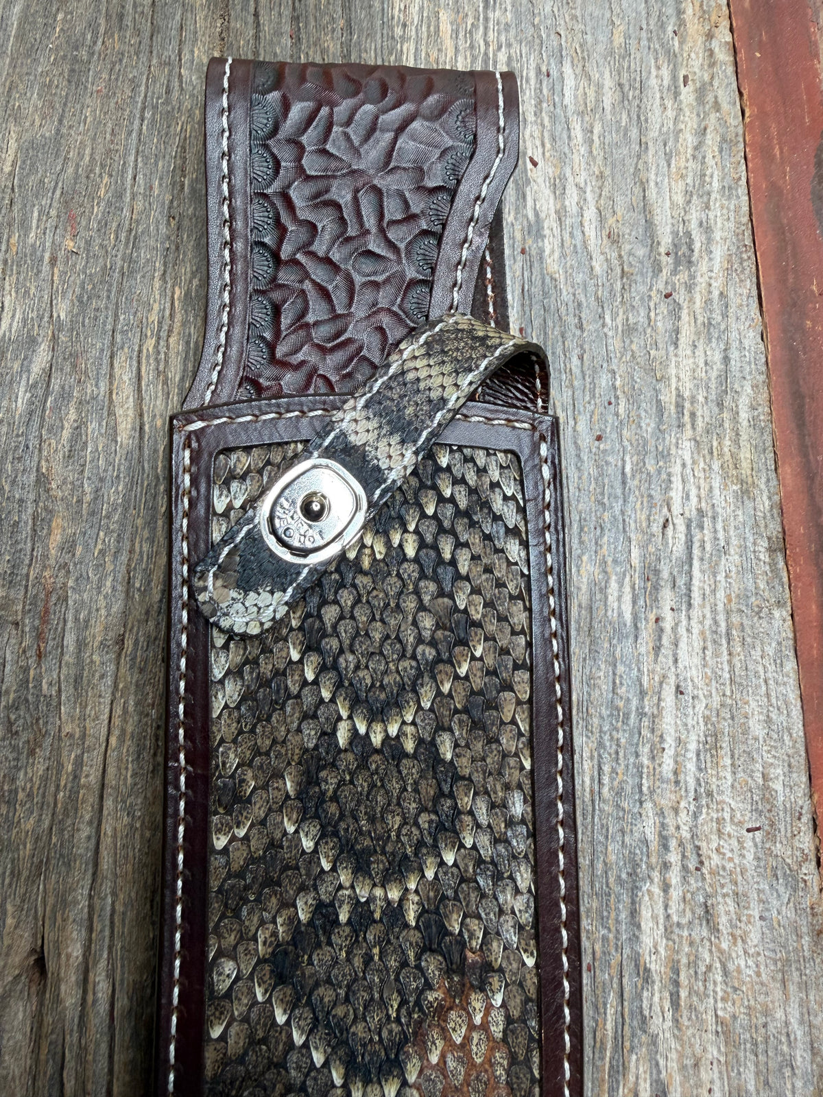 Randall Model Large Sasquatch sheath with a Western Diamondback RattleSnake skin from Treeman Sheaths. Very dark skin and quite honestly the nicest one I’ve had in WDB.