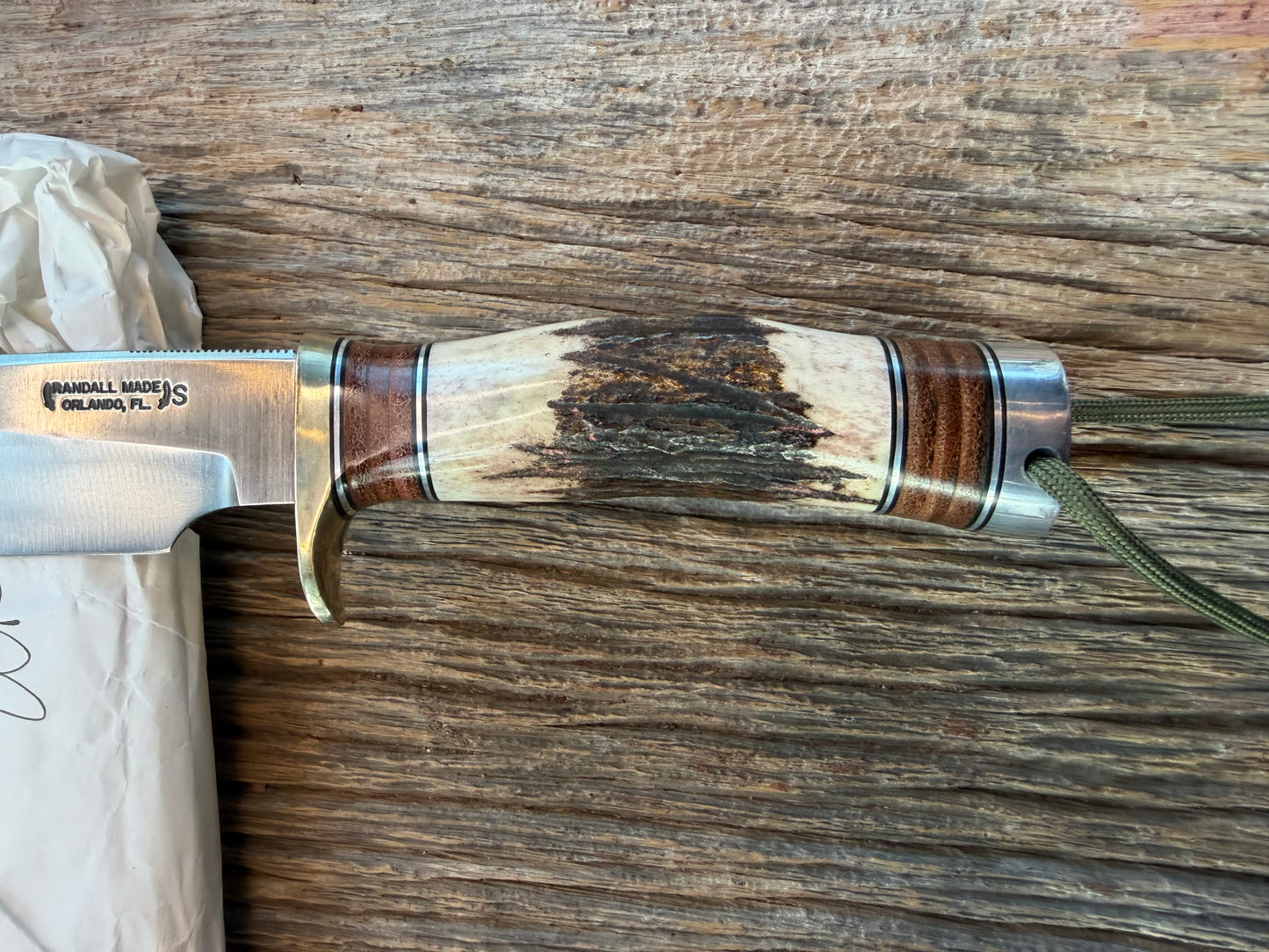 New in paper Randall Knife Model 25-6 Trapper in Stag Leather Handle Stainless Blade, NSH